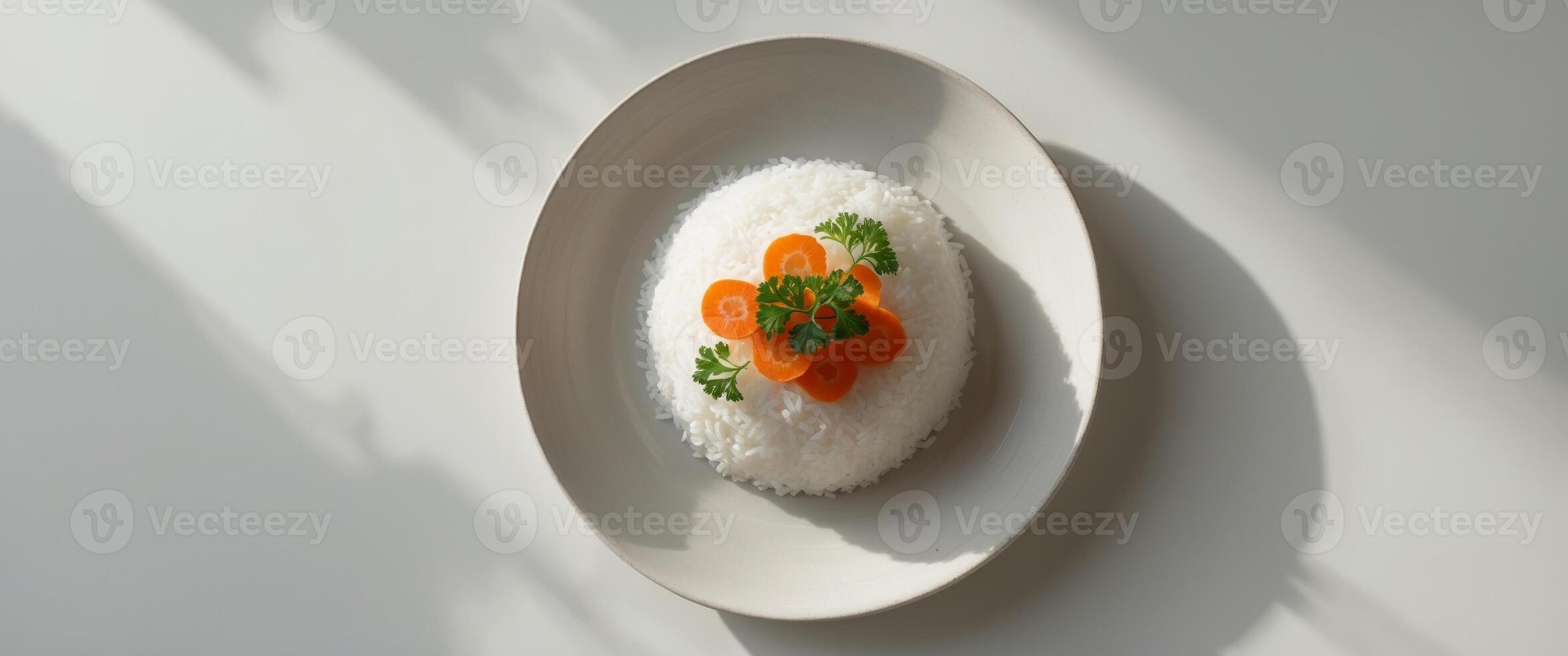 A plate of rice with carrots and parsley on top photo