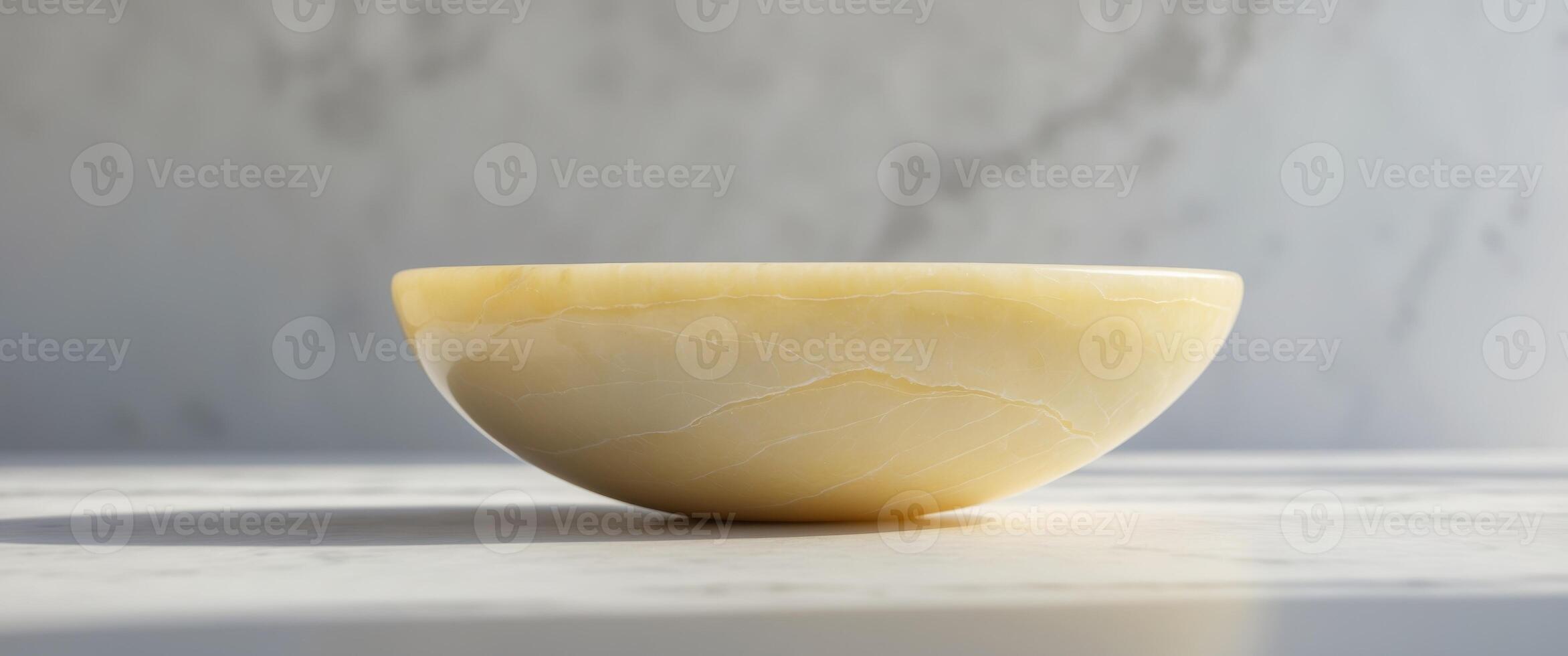 Smooth surface of polished yellow onyx stone creating a beautiful background for various design purposes photo