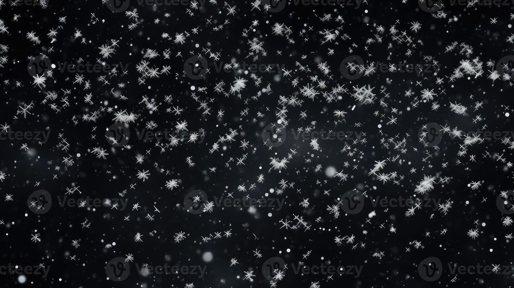 falling snow on black background photo