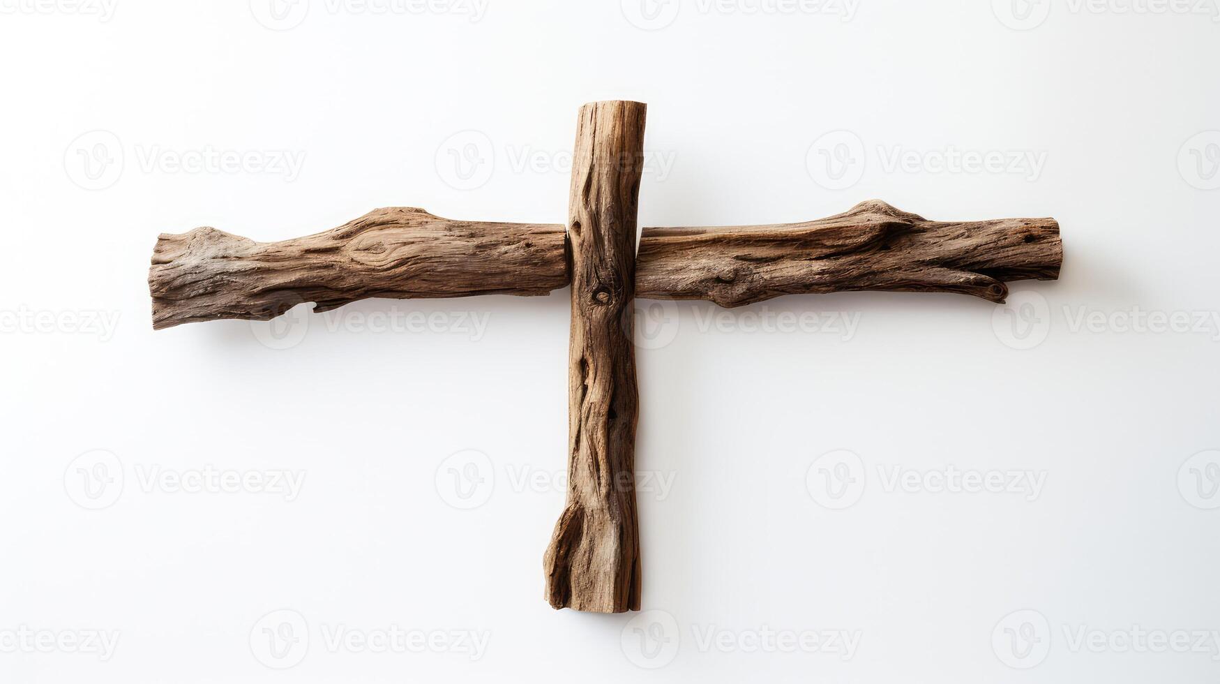 rustic wooden cross on white background photo