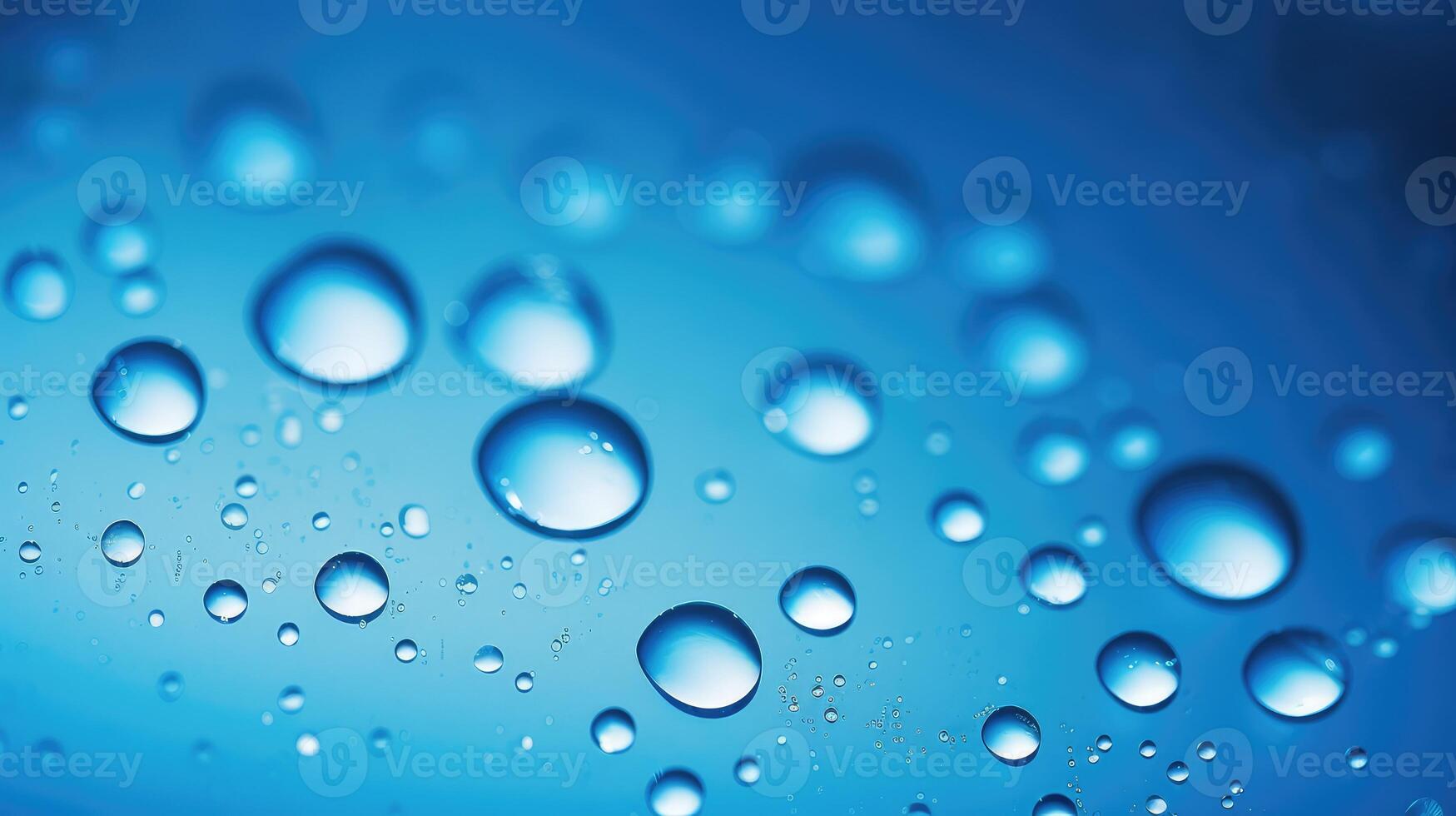 translucent water drops on blue background photo