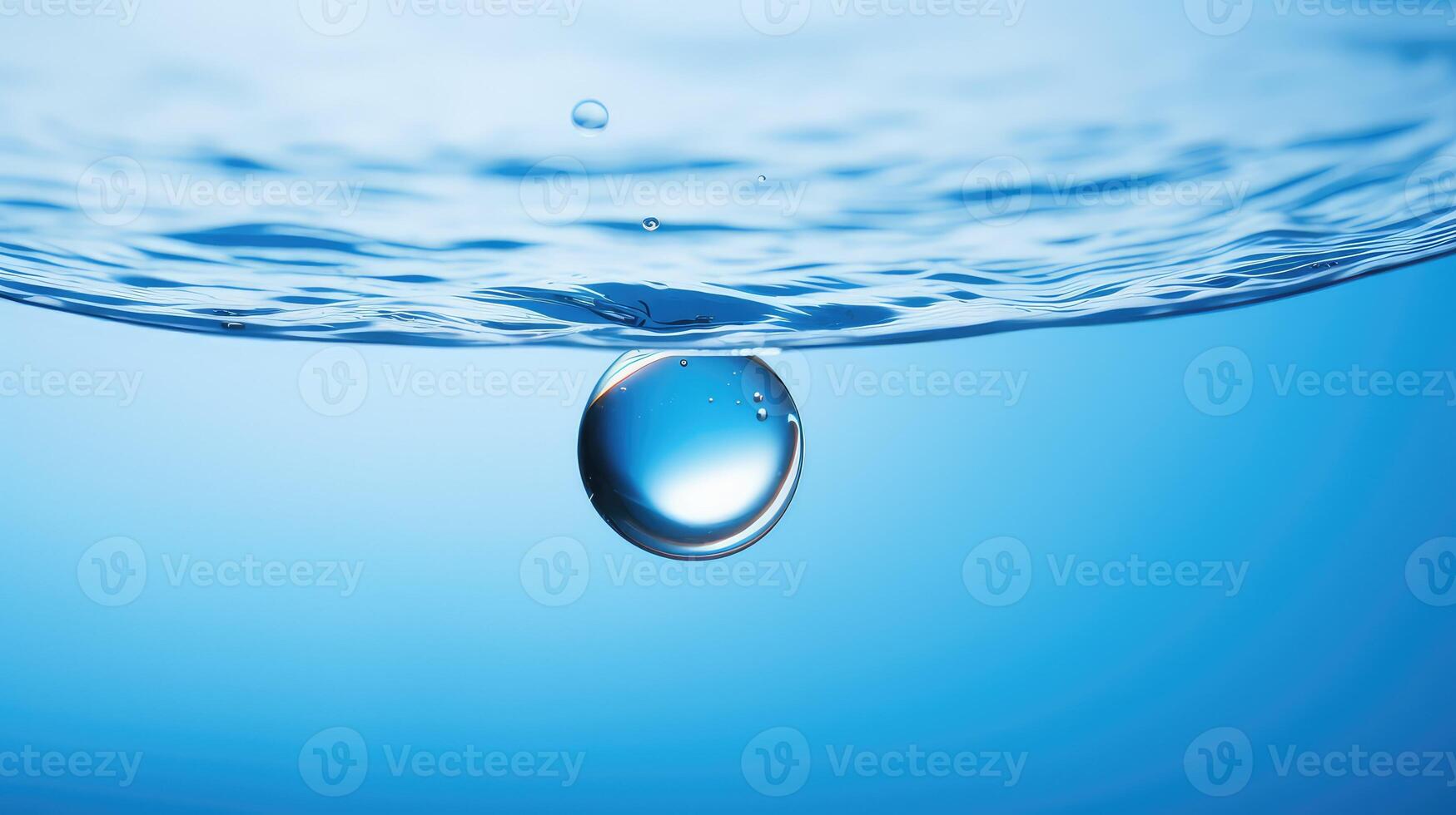 spherical water drops on blue background photo