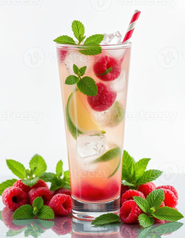 Refreshing raspberry and mint cooler served in a tall glass with ice and garnished with fresh mint leaves photo