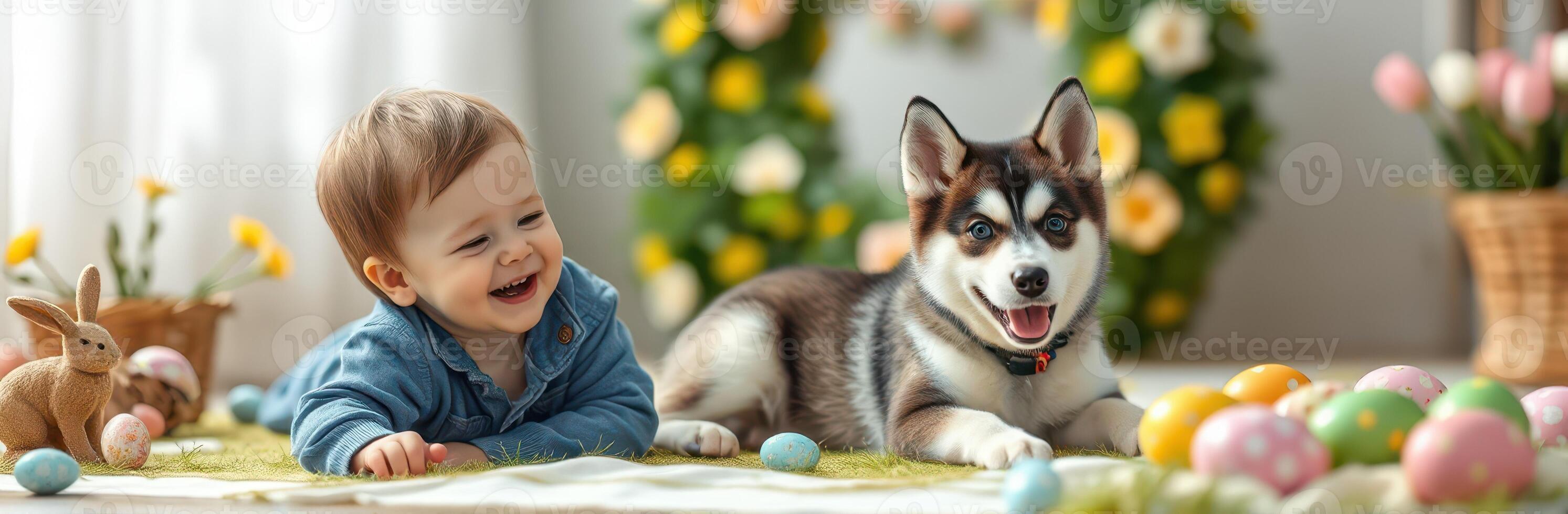 Happy baby and playful puppy enjoy Easter egg hunt in colorful spring setting photo