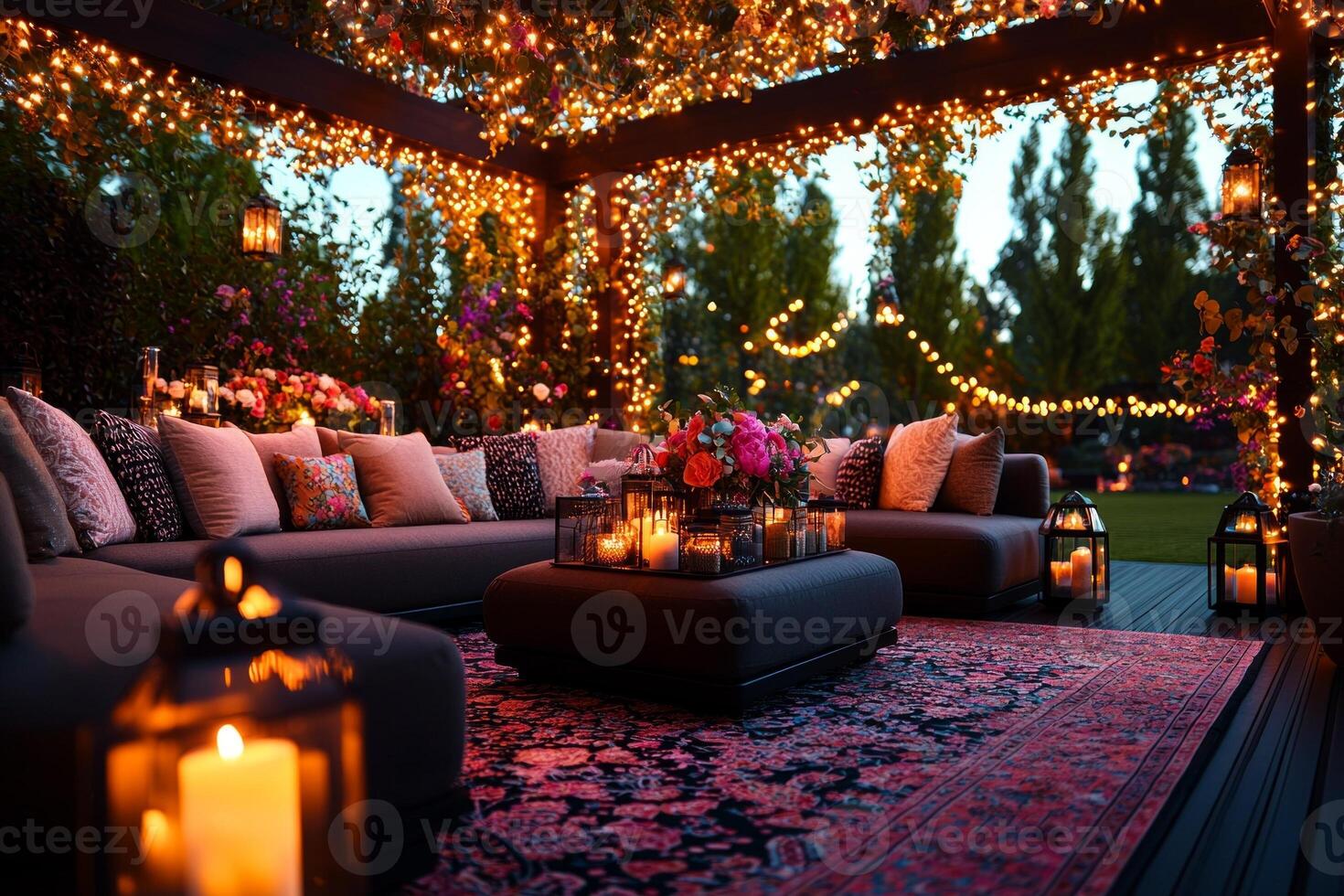 inviting outdoor patio is elegantly arranged for Iftar adorned fairy lights and glowing lanterns. low table is surrounded festive cushions flowers and warm candlelight photo