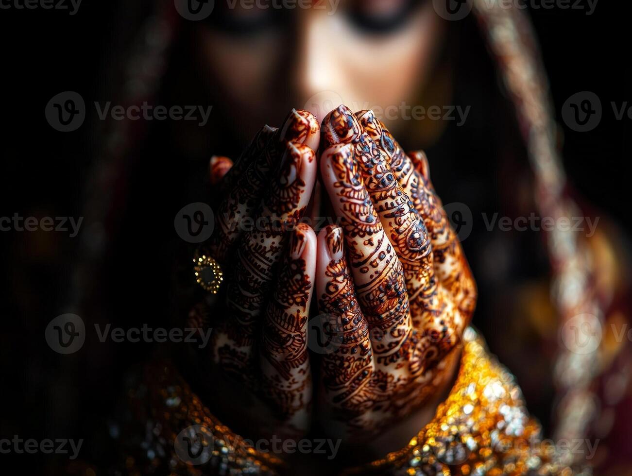 woman intricately designed henna on her hands delicately adjusts her golden scarf surrounded warm glow of evening light as she prepares for Eid al Fitr festivities family photo