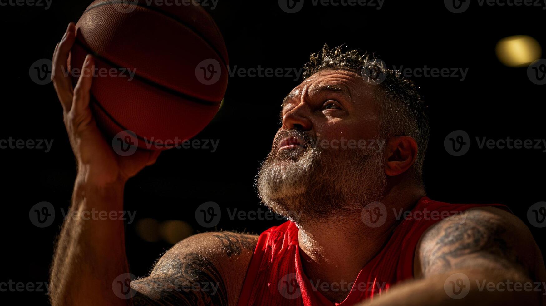 Latino amputee athlete powers through competitive wheelchair basketball match leaping catch ball mid air in brightly lit gym. Intensity fills atmosphere photo