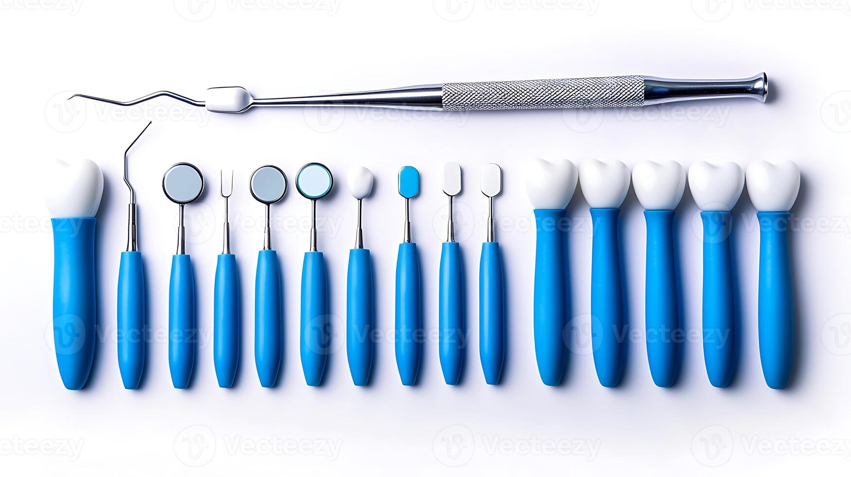 A collection of dental tools arranged neatly on a white background for professional use photo