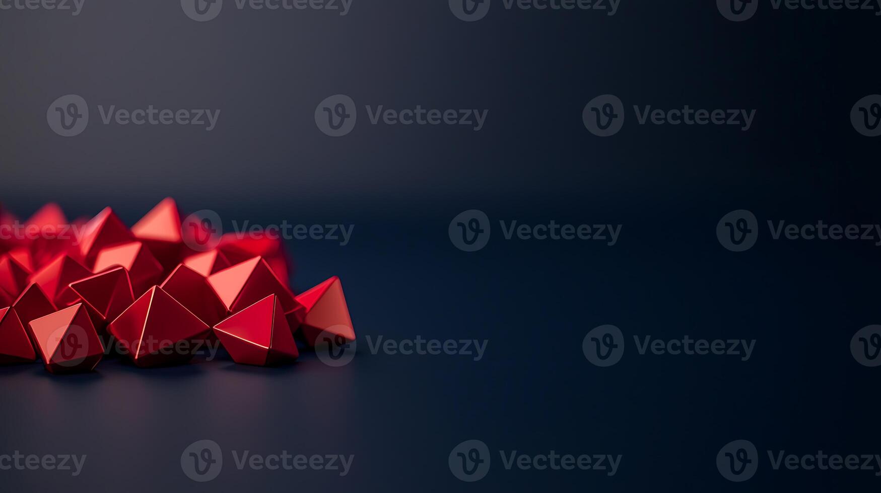 A pile of red triangles on a dark background photo