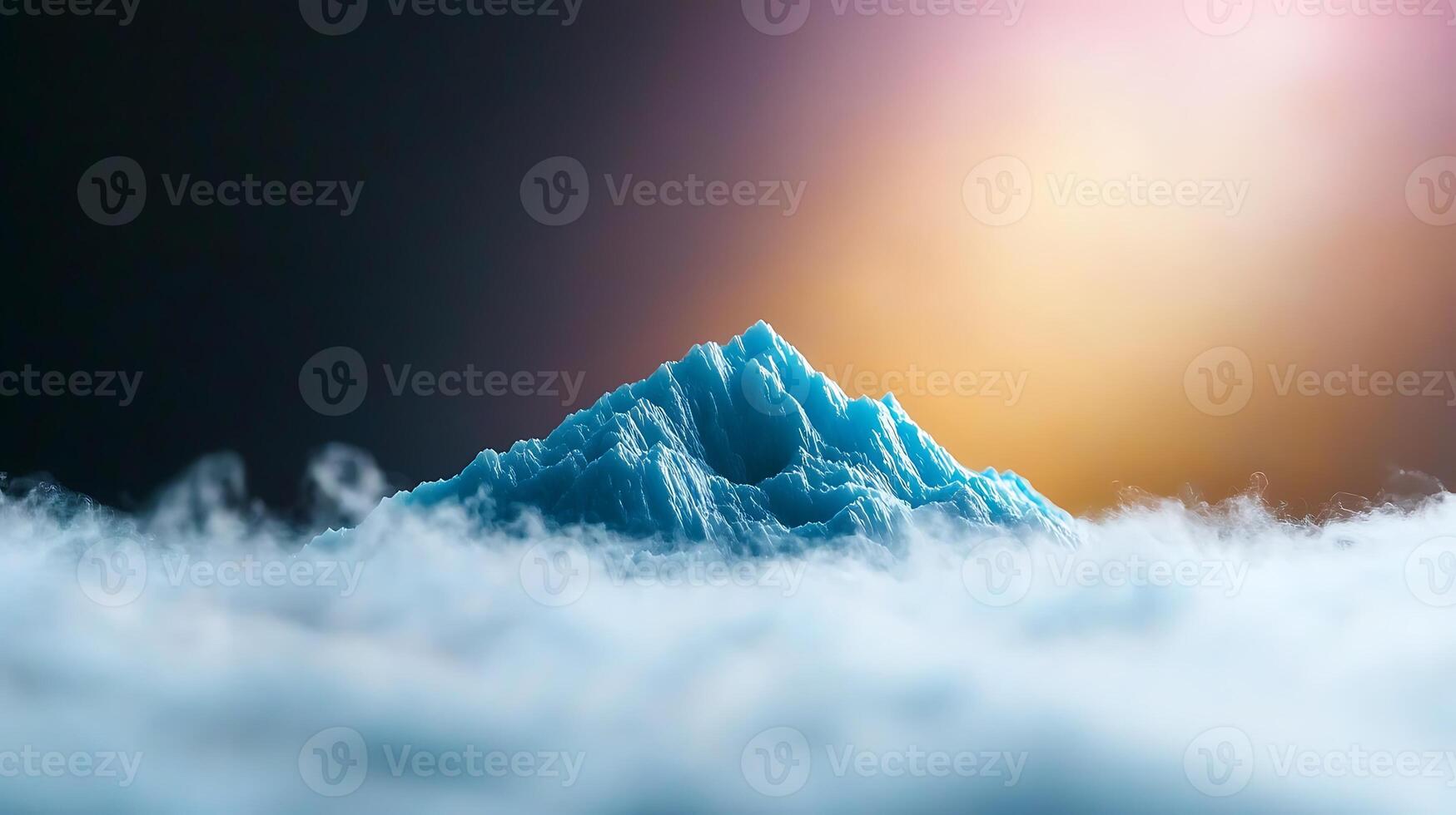 A mountain is shown in the clouds with a bright light photo
