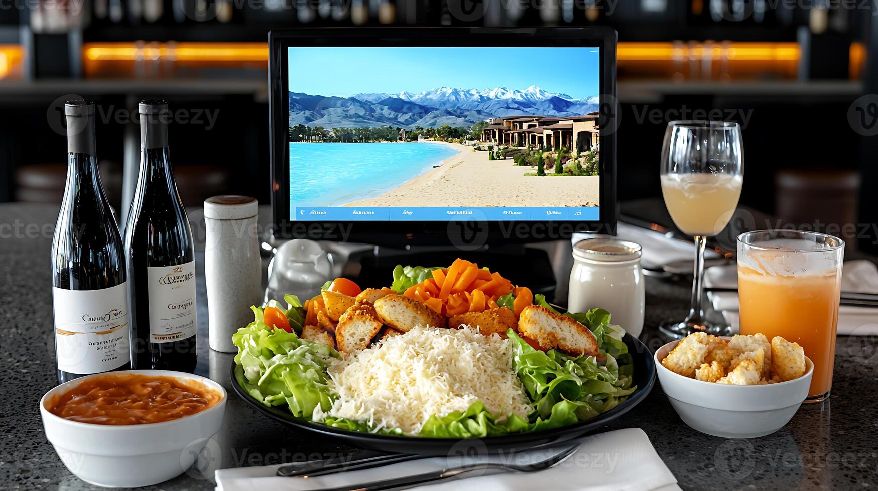 A table with a plate of food and drinks photo