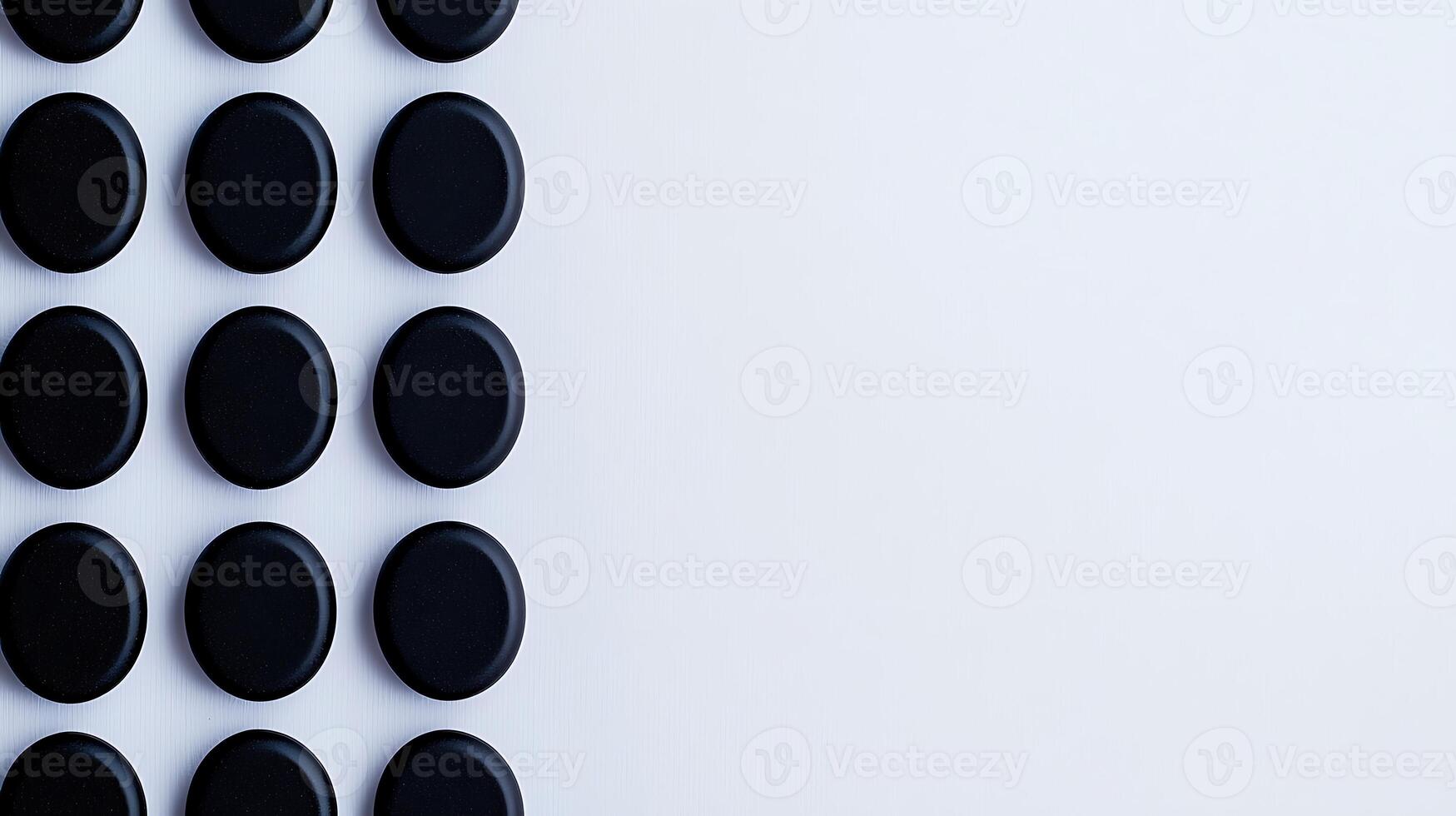 A black and white background with many black and white circles photo