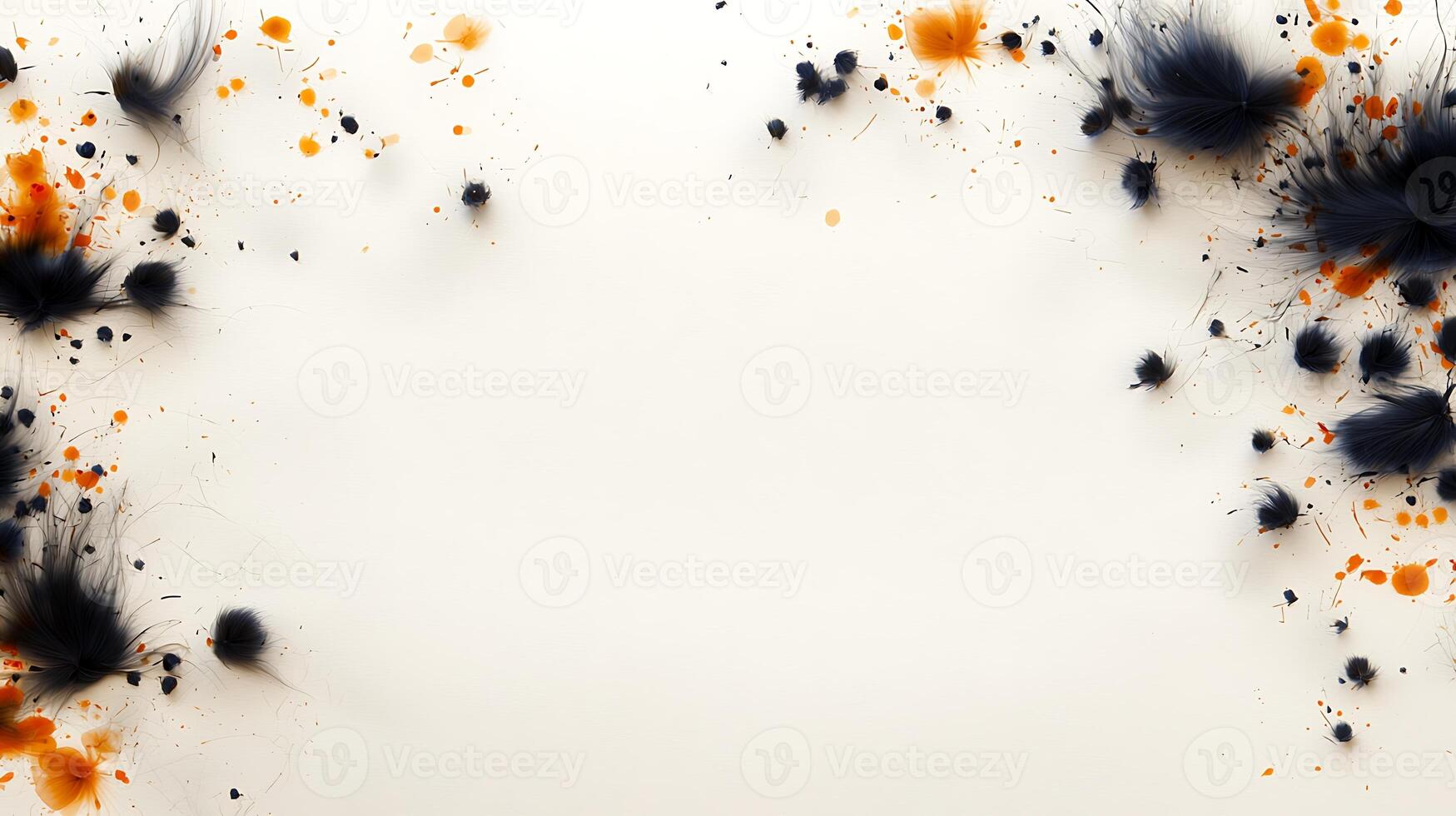 A white background with black and orange paint splatters photo