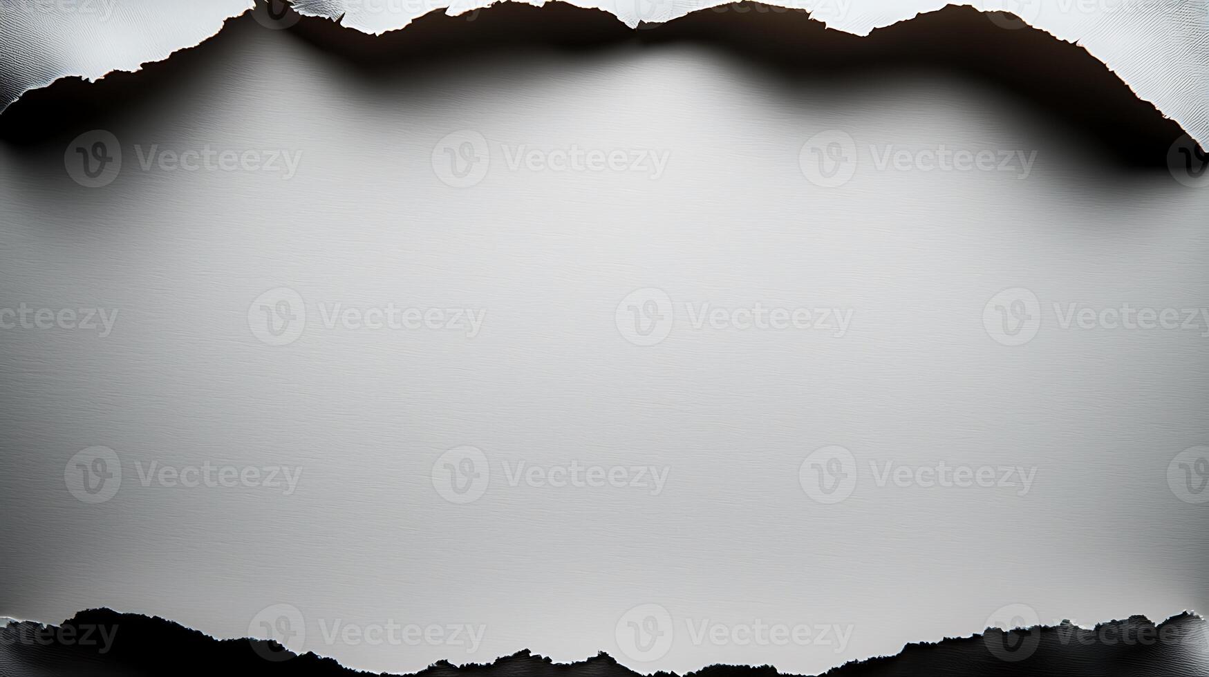 A hole in the paper with a hole in the middle photo