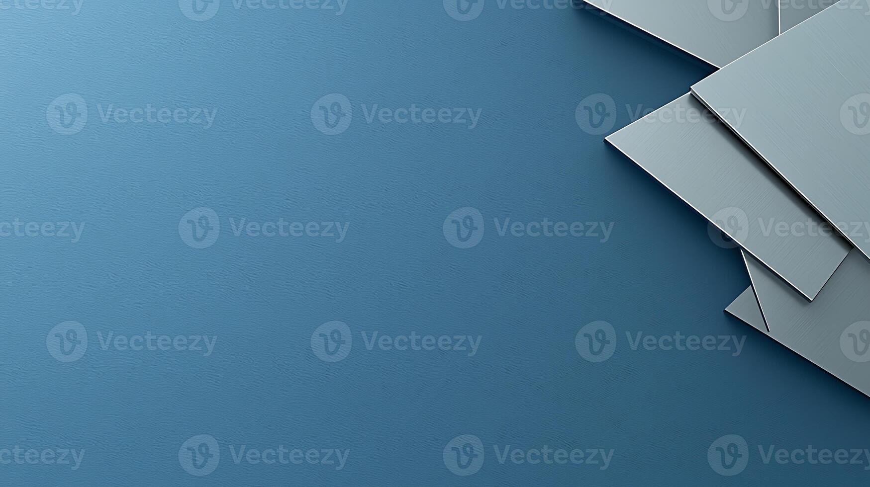 A blue background with a few pieces of paper photo