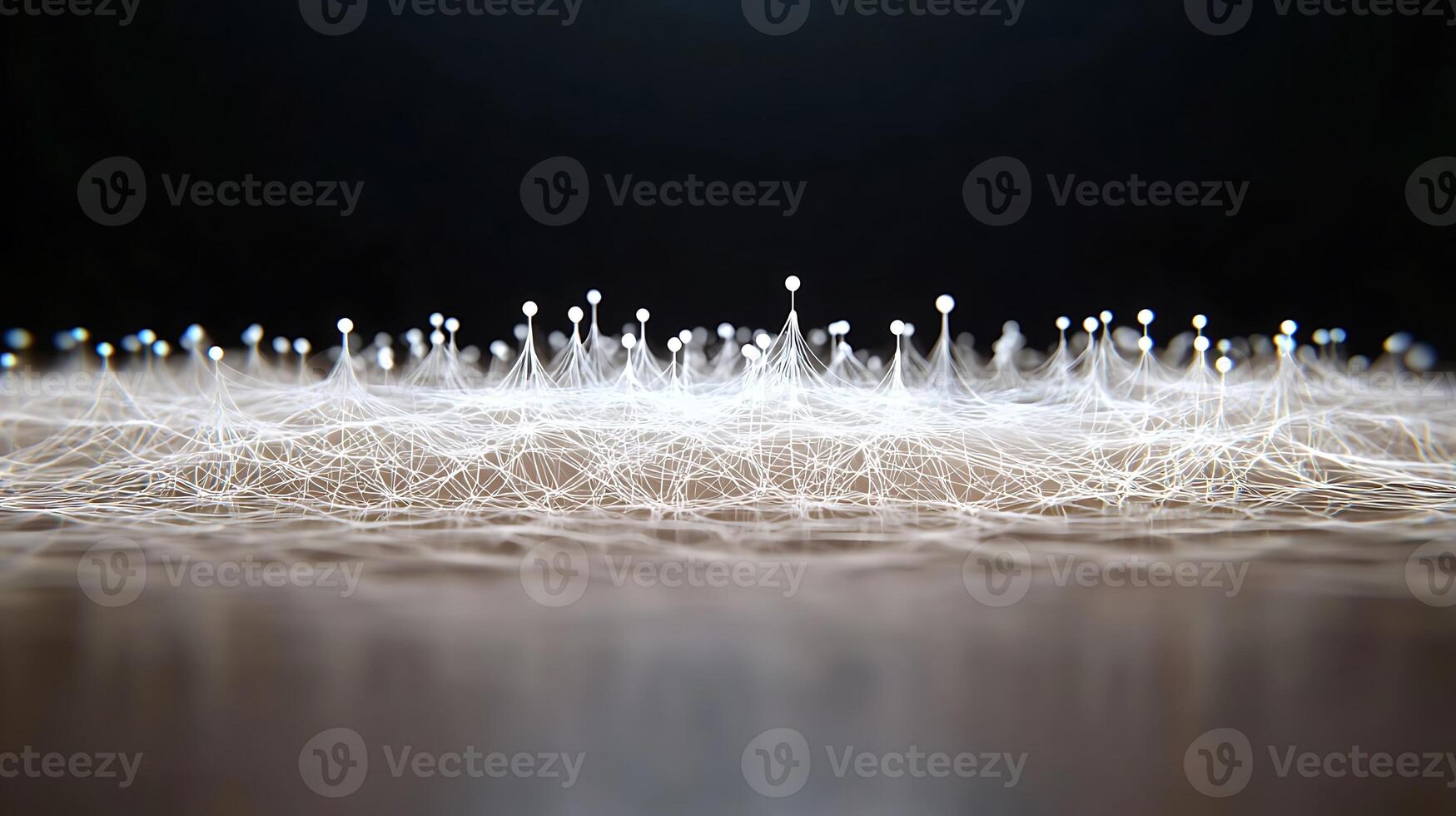 A group of white dots on a black surface photo