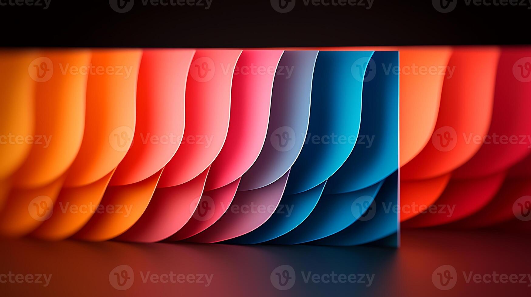 A colorful paper fold with a black background photo
