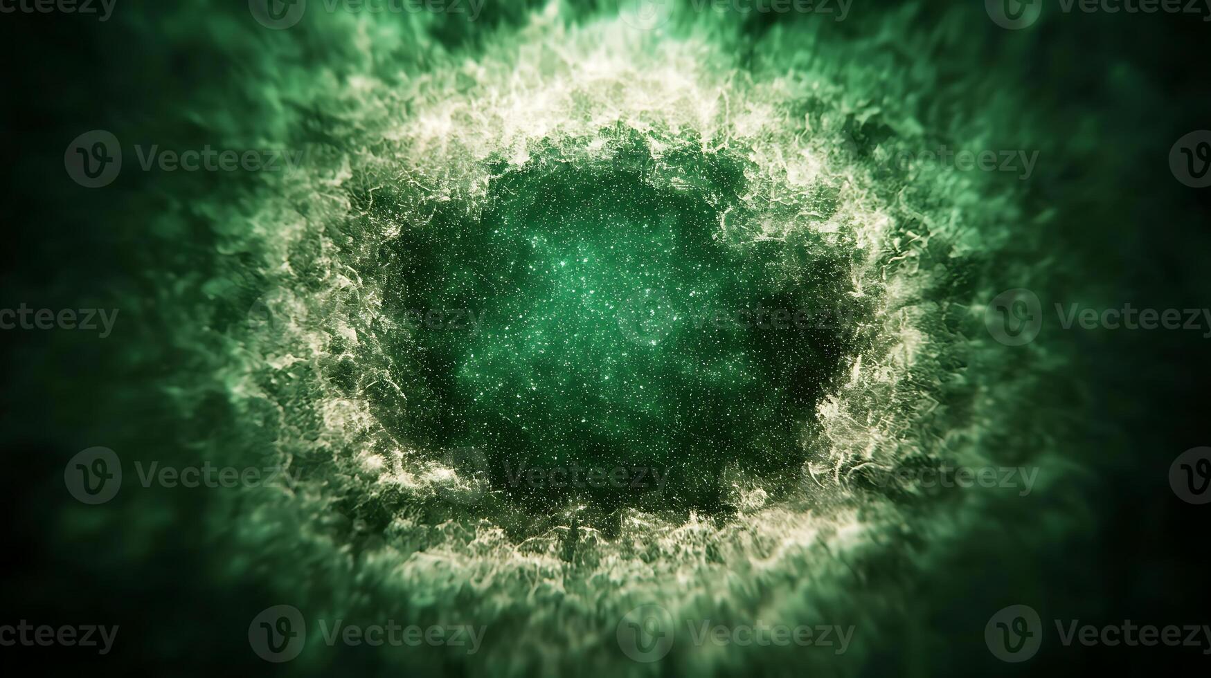 A green and white circular shape in the dark photo