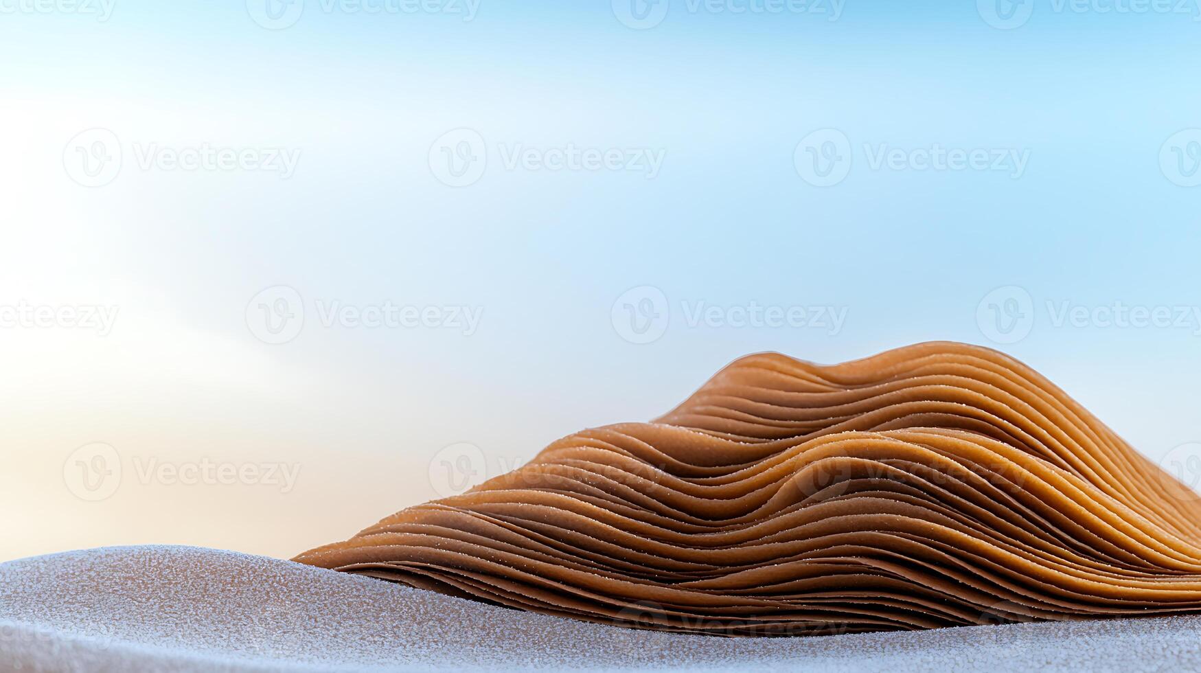 A mountain made out of sand in the desert photo