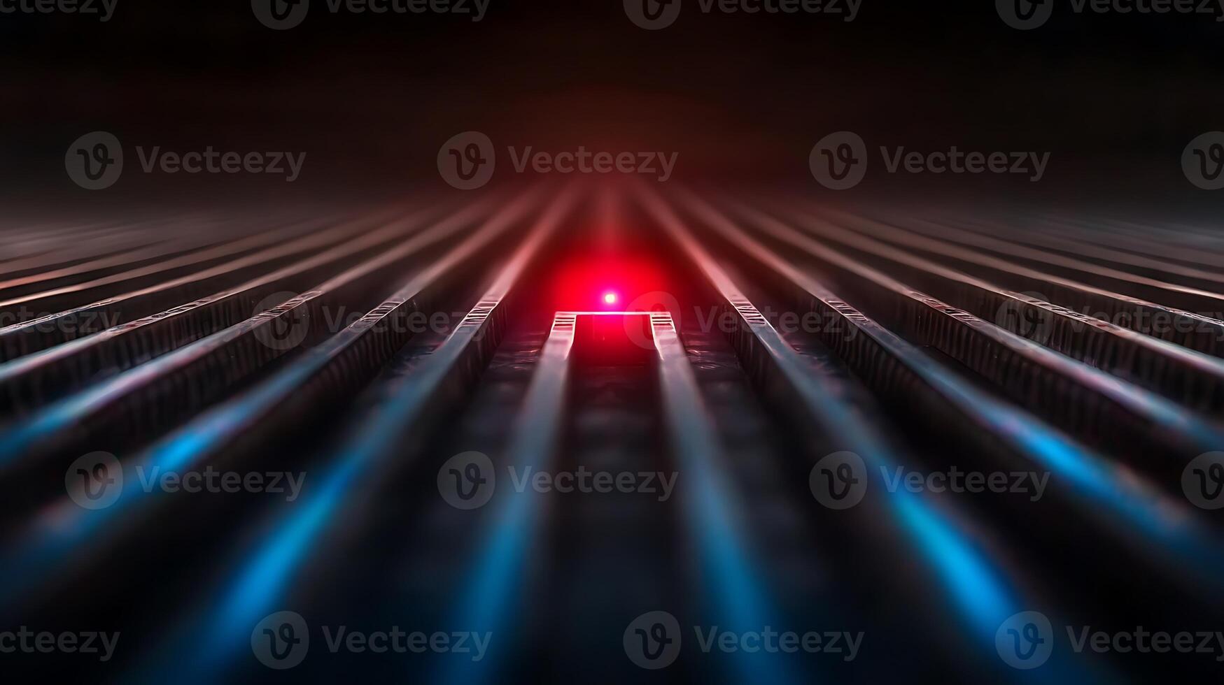 A red light is shining on a dark background photo