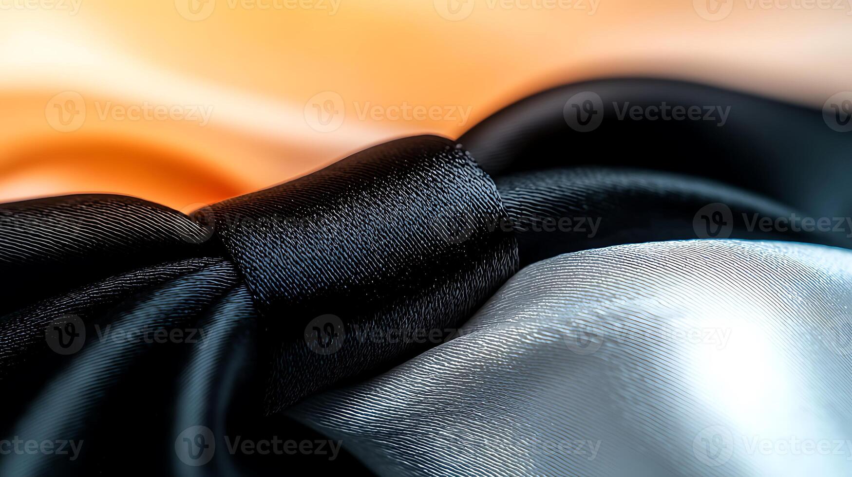 A close up of a black and white silk bow tie photo