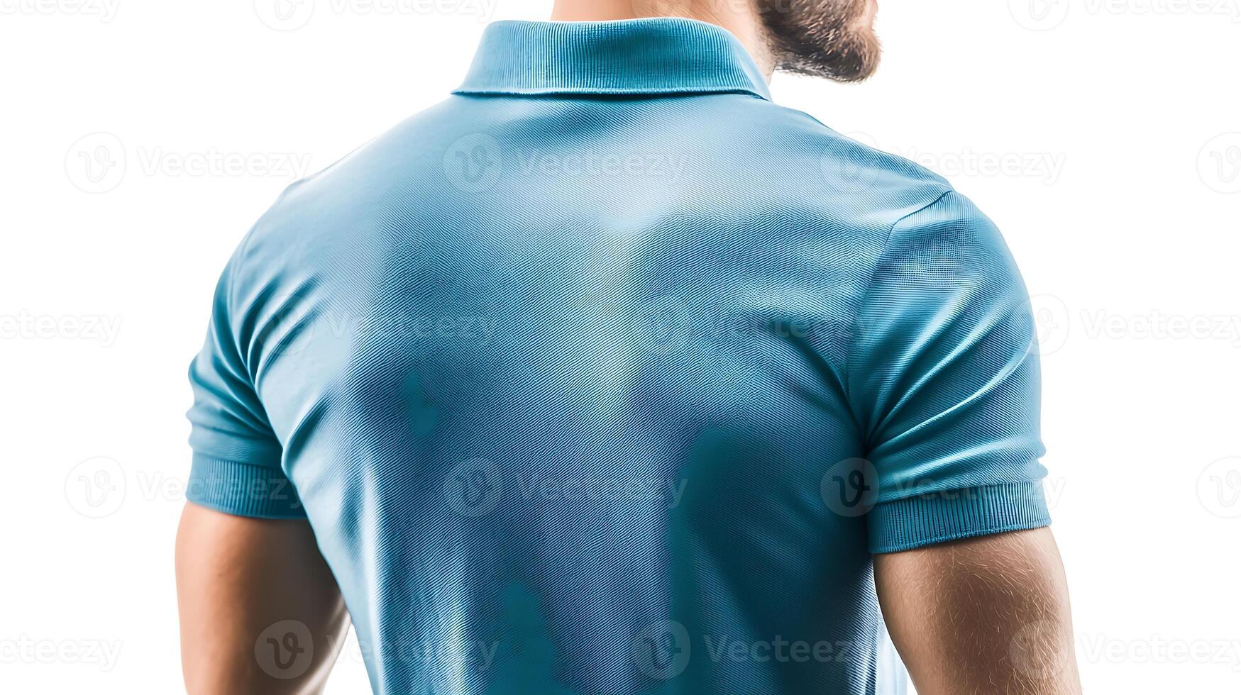 A man in a blue shirt is looking at something photo