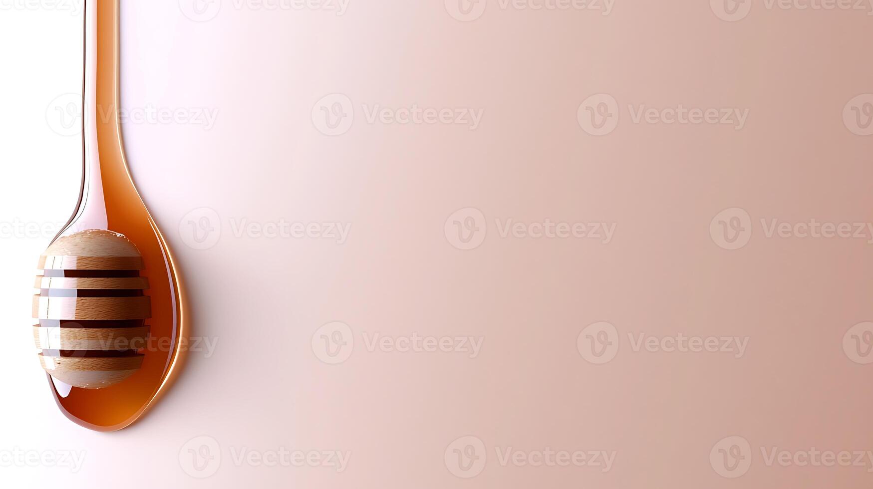 A spoon with honey on it photo