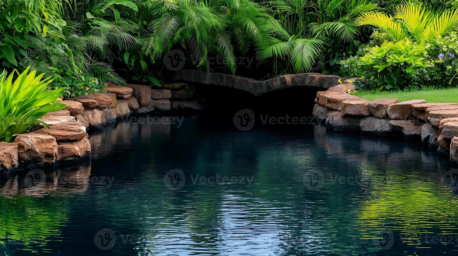 A pond surrounded by lush green vegetation photo