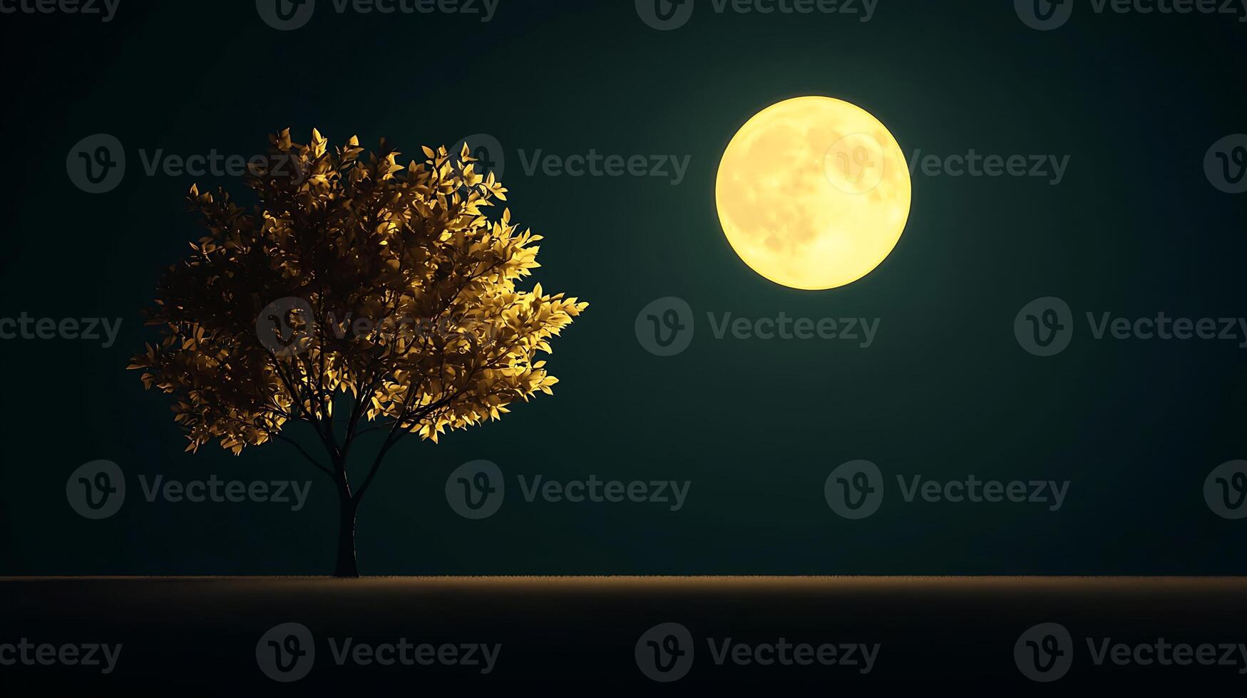 A tree and a full moon in the night sky photo
