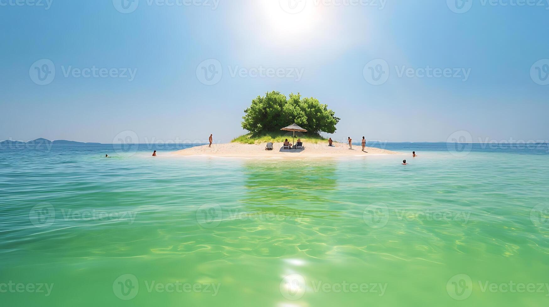 An island with a small tree on it in the middle of the ocean photo