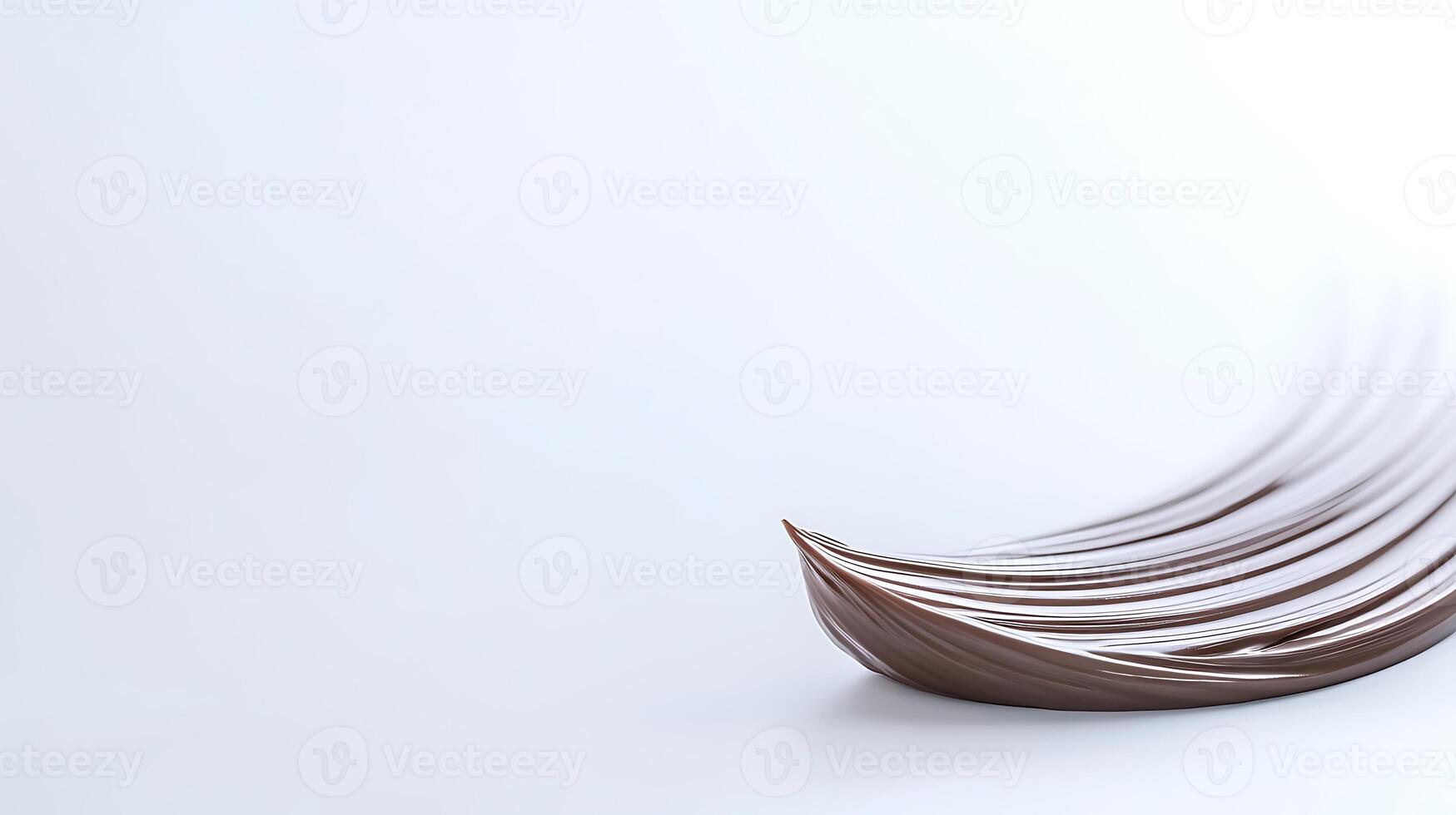 A chocolate bar with a wave of chocolate photo