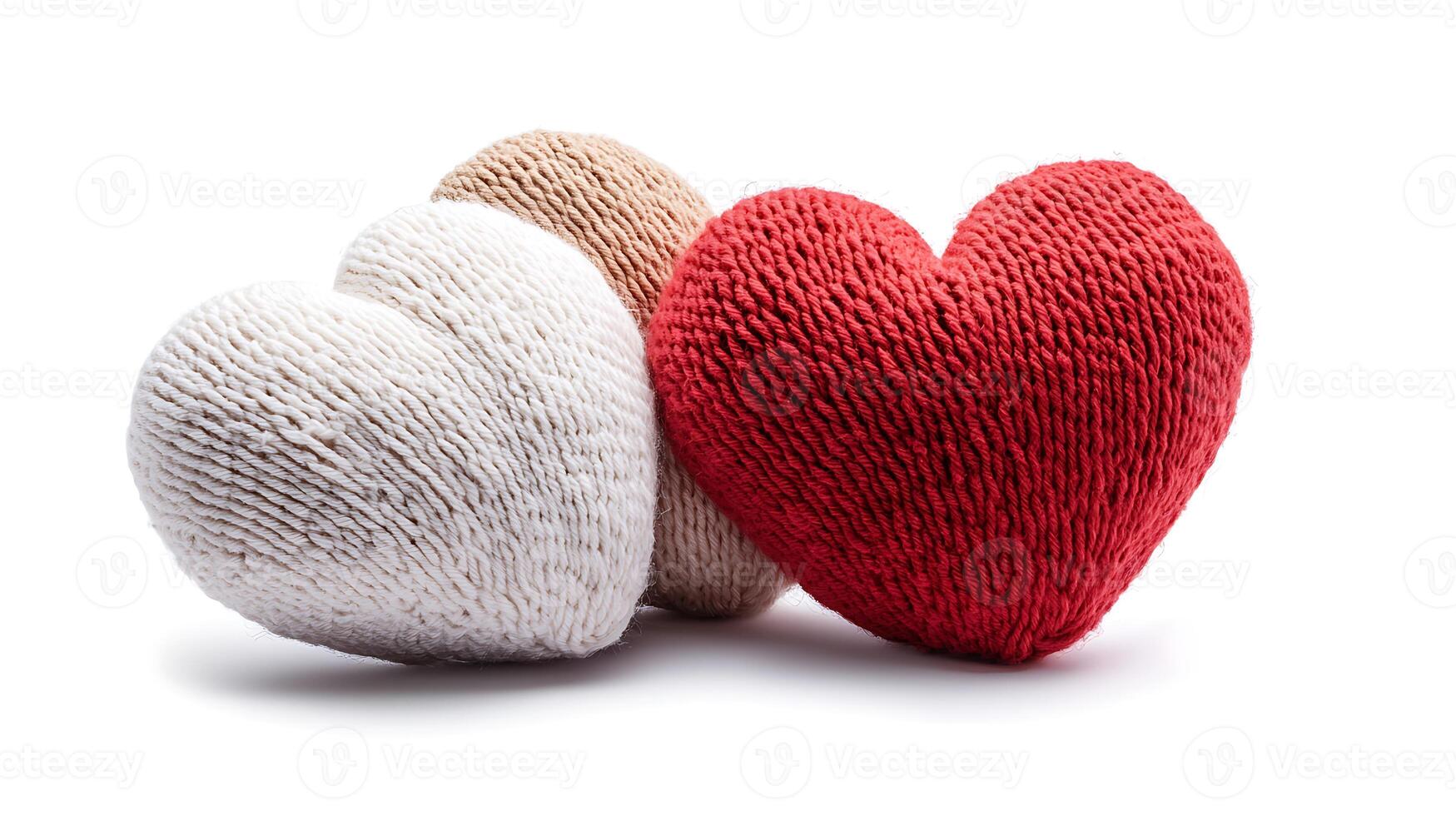 Three heart shaped pillows on a white background photo