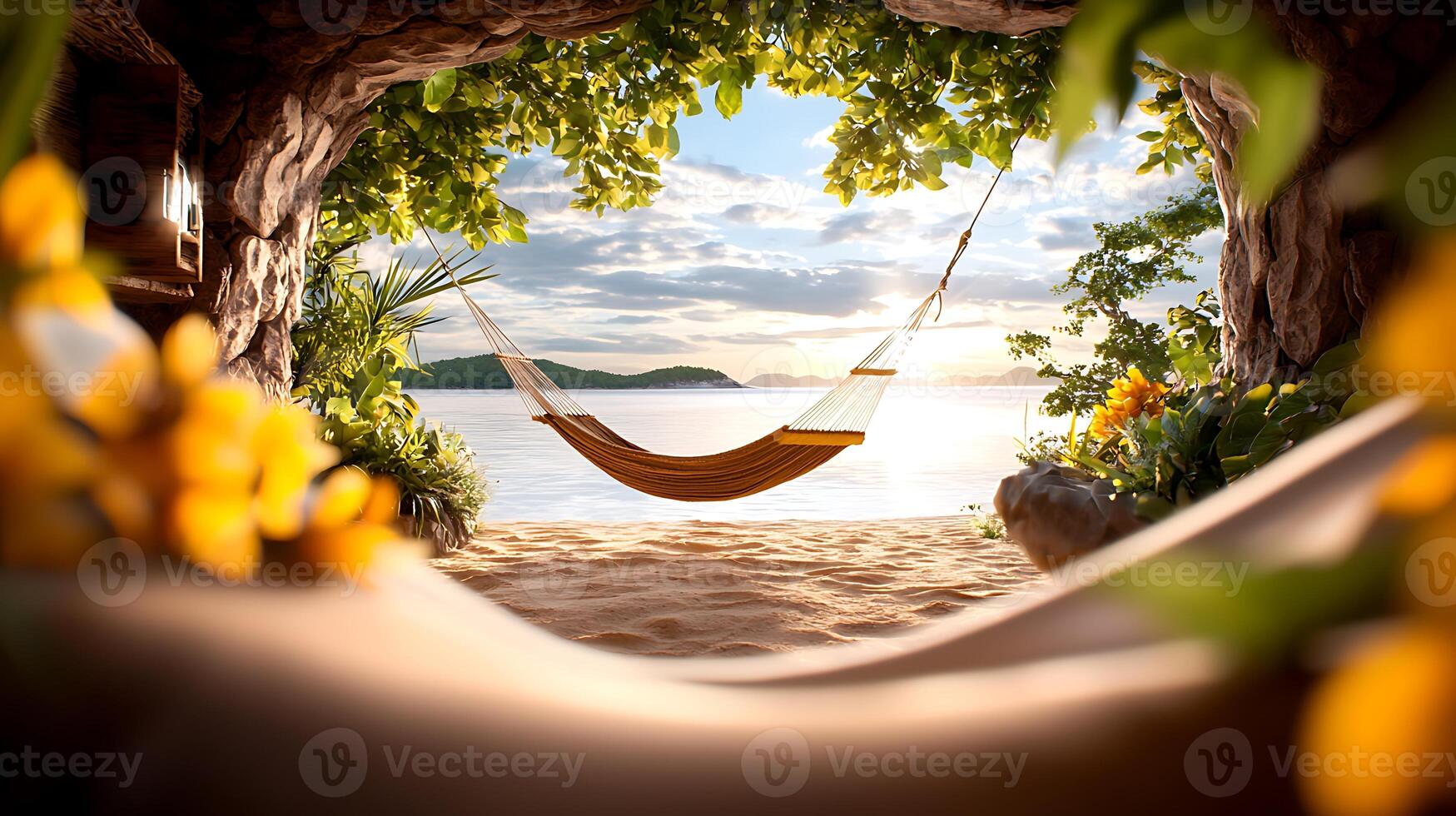 A hammock is hanging in a tunnel on the beach photo
