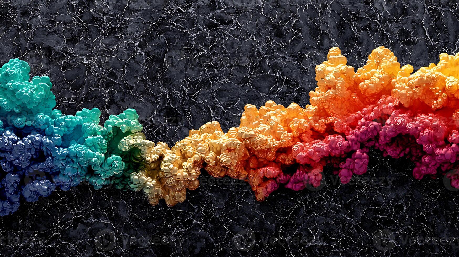 A rainbow colored line of paint on a black background photo