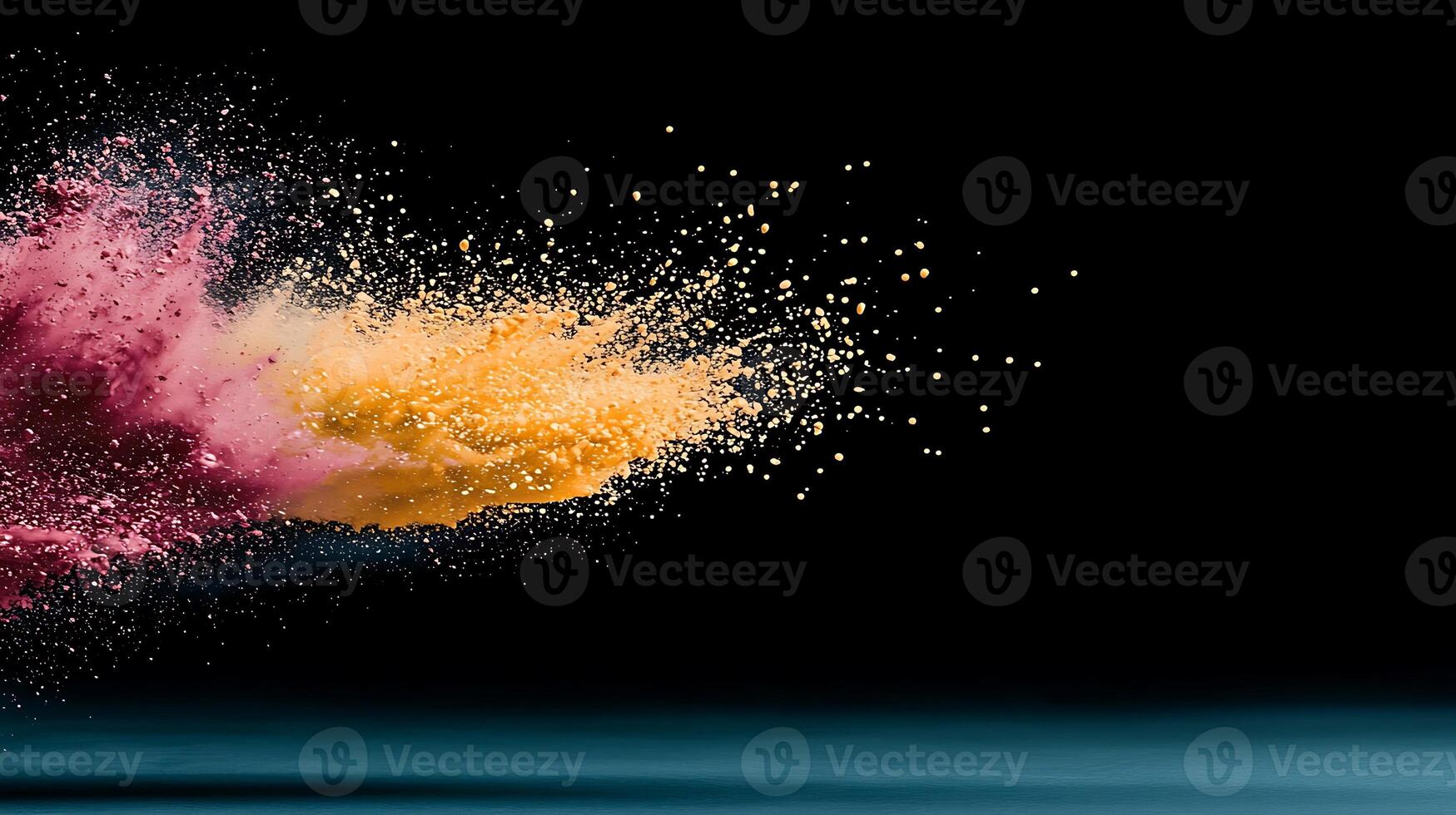 Colorful powder explosion on black background photo