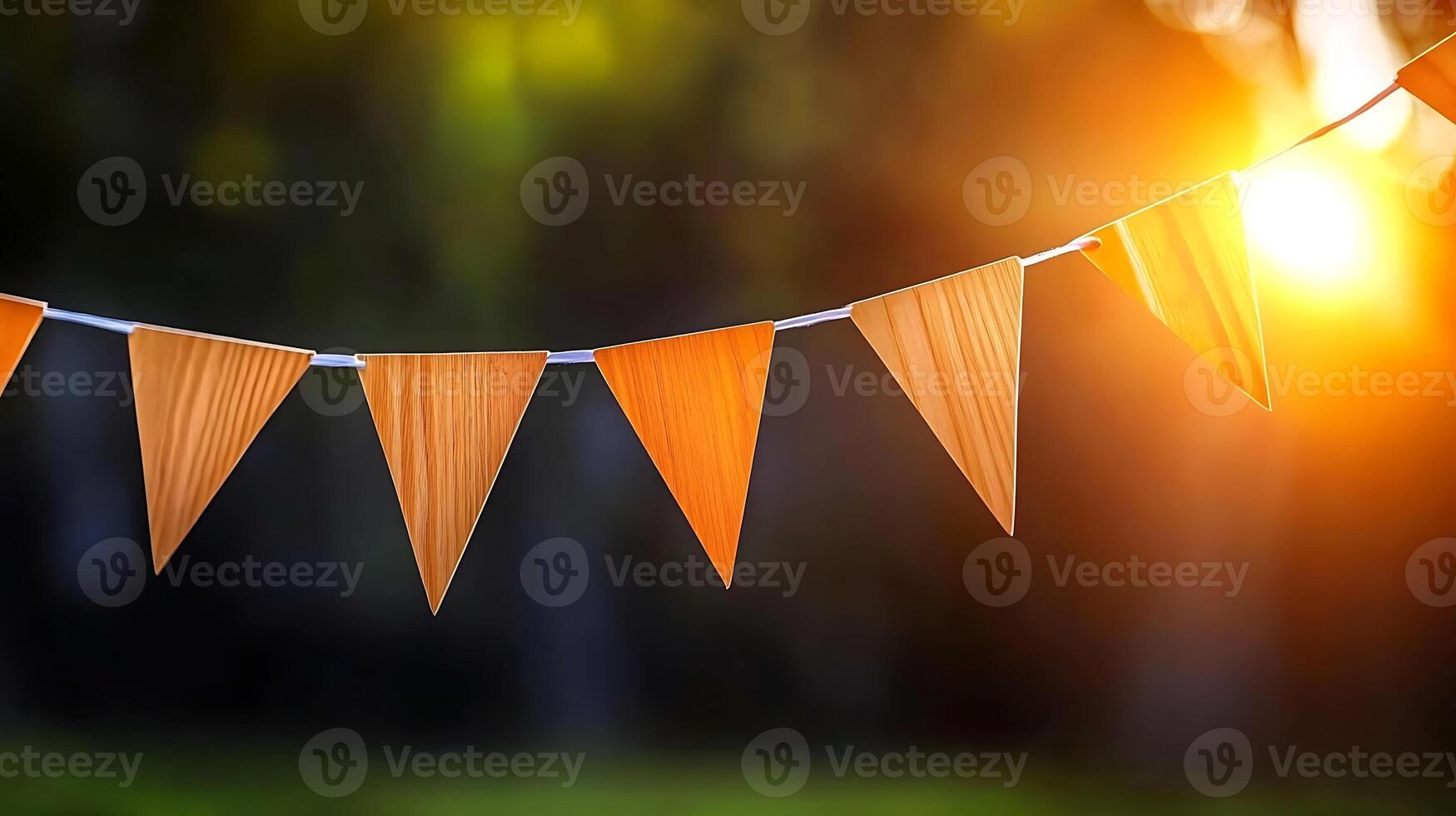 Orange bunting flags in the sun photo