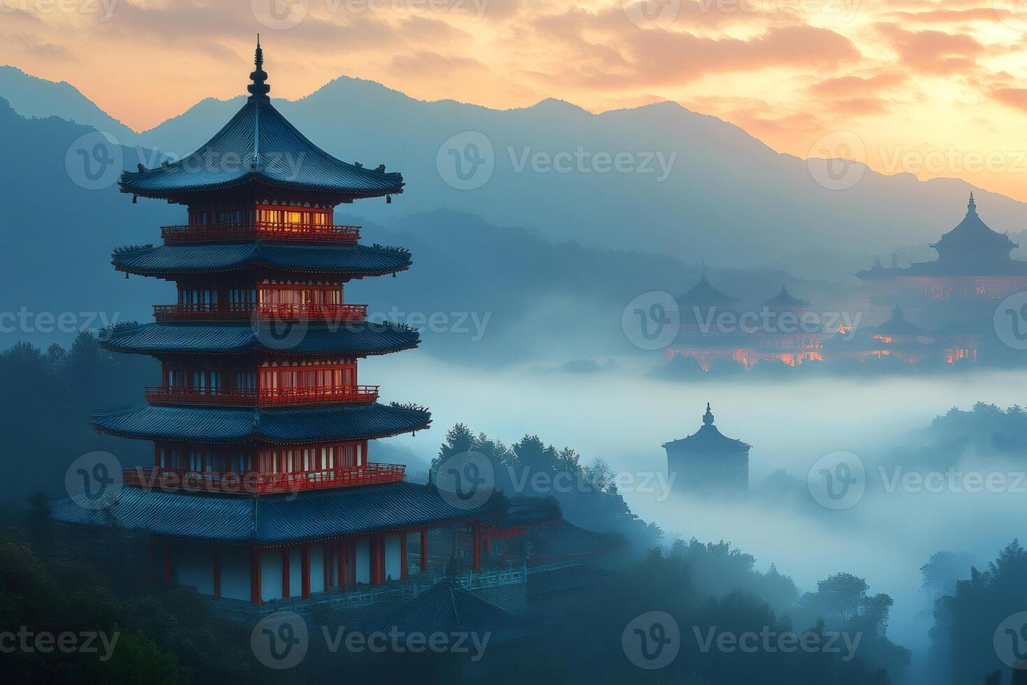 Mystical sunrise illuminating traditional chinese pagoda and temples in the mist photo