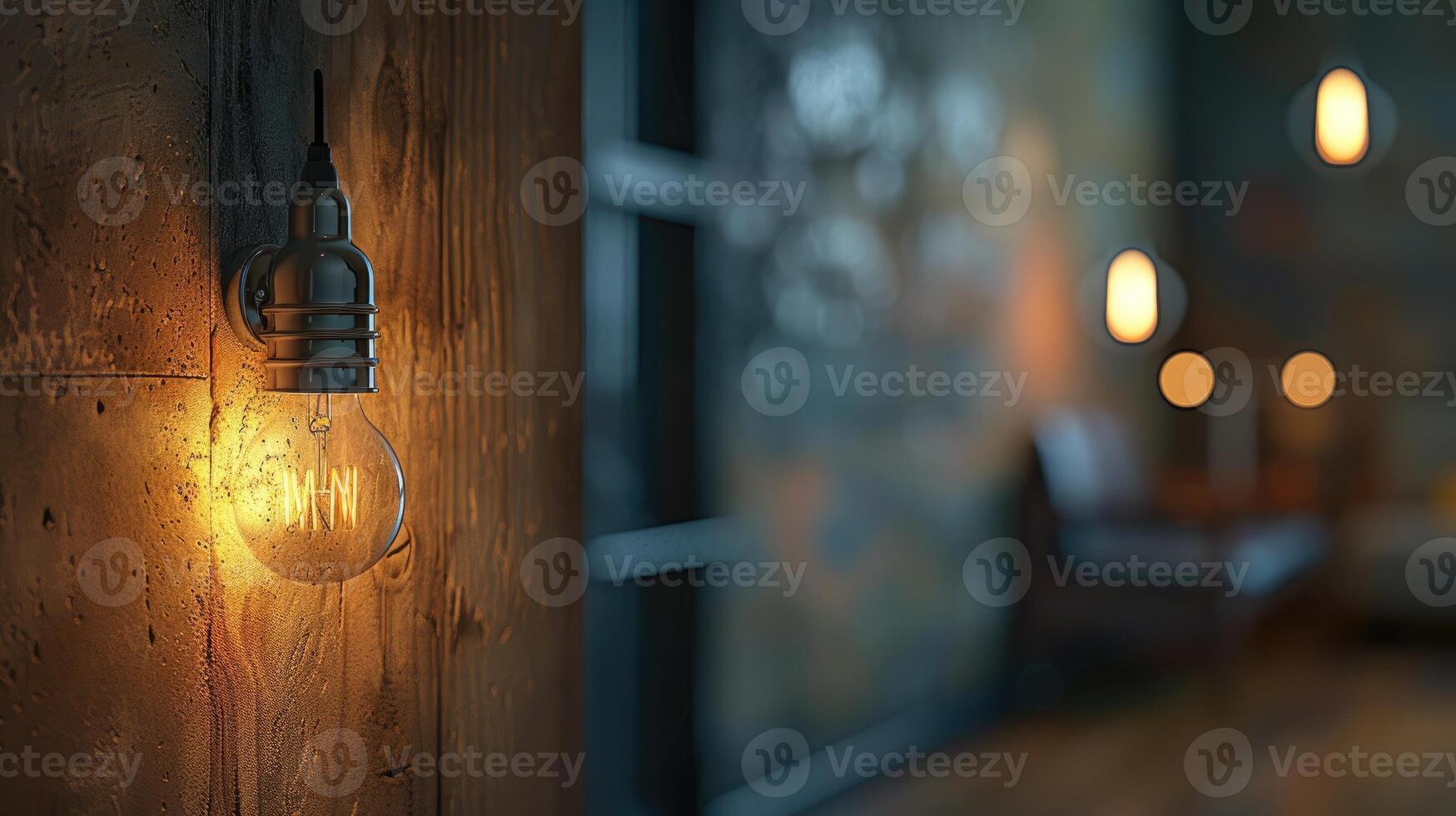 Light bulb in a socket casting warm glow in a cozy room with a window photo
