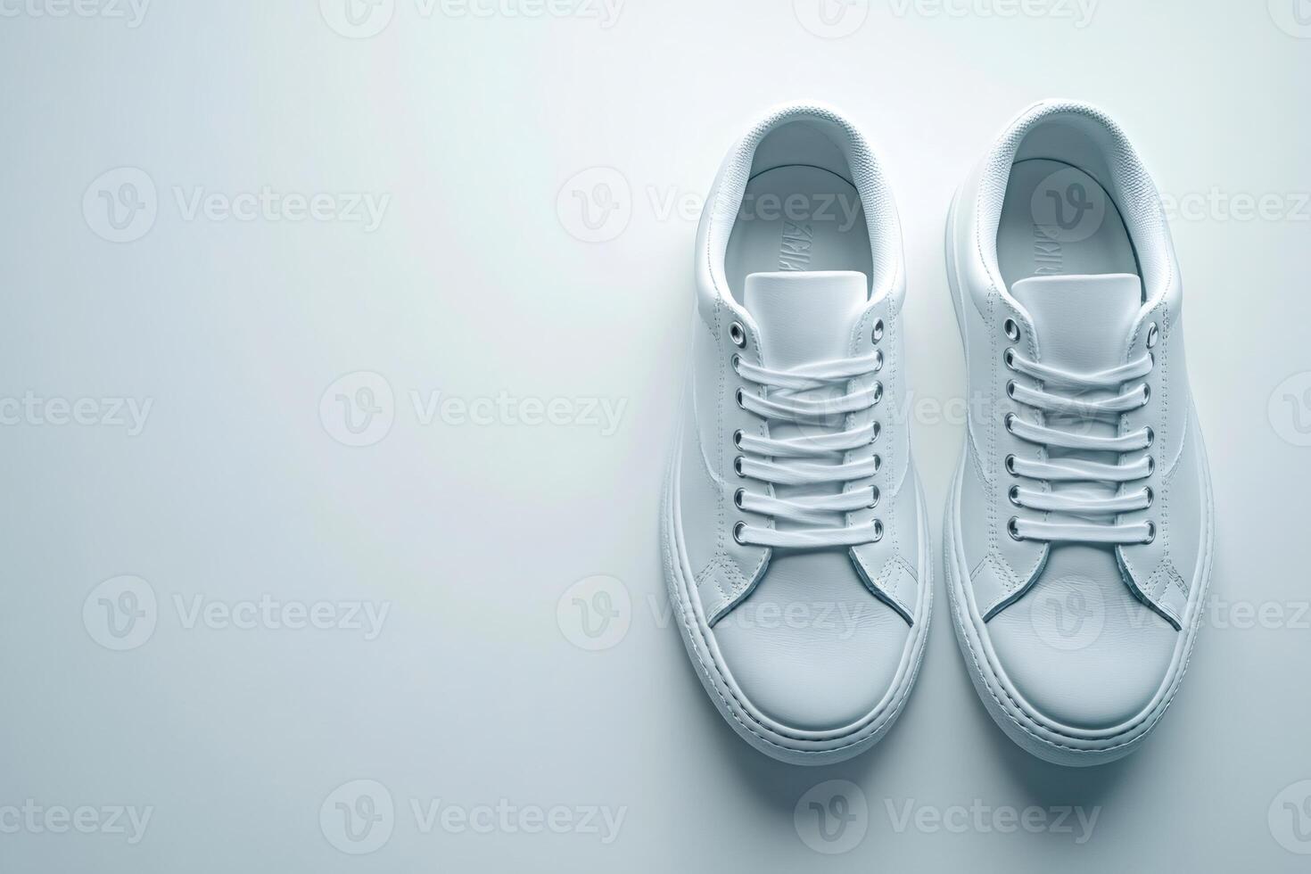 Modern white leather sneakers embody minimalist style, perfect for urban living and casual fashion photo