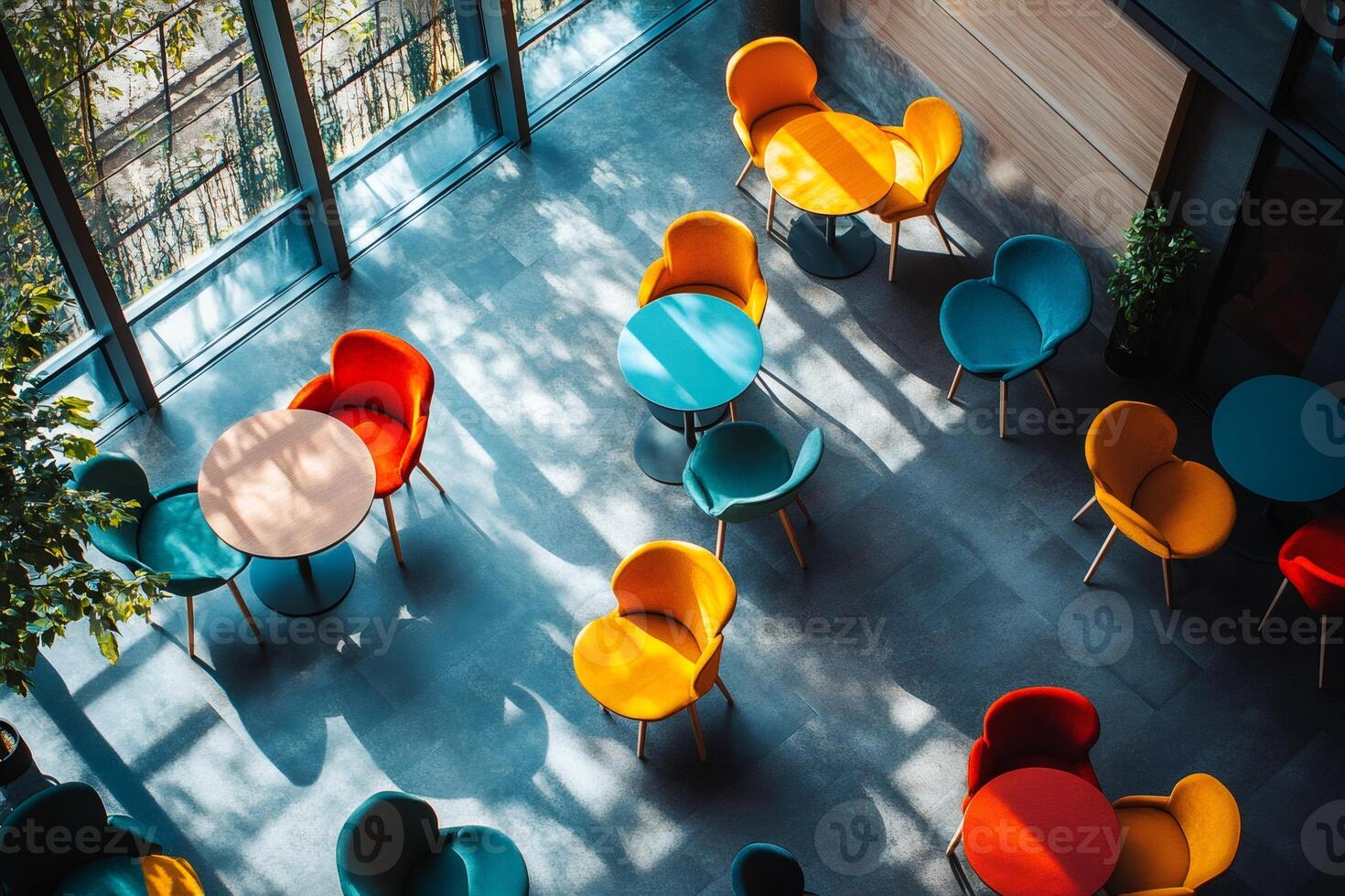 Colorful chairs and tables creating a vibrant and modern waiting area photo