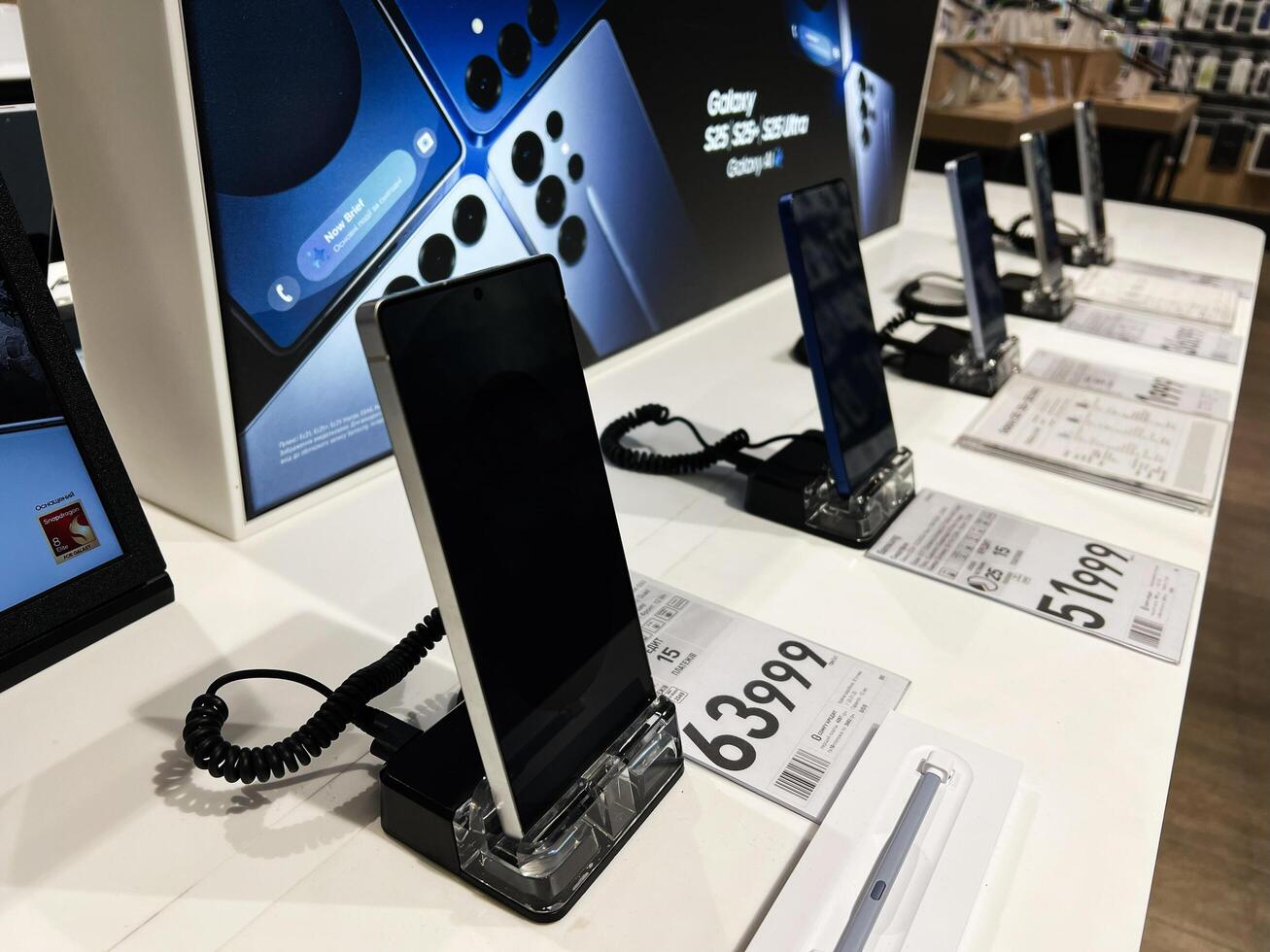 Kyiv, Ukraine - February 04, 2025 Smartphone Samsung display showcase highlighting advanced models and features in electronics store photo