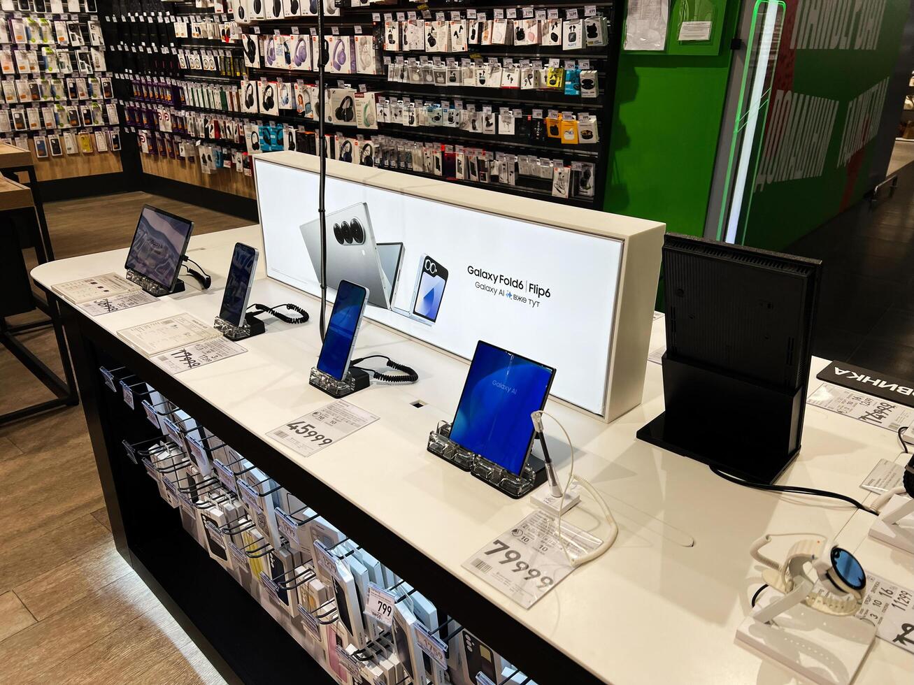 Kyiv, Ukraine - February 04, 2025 Modern smartphone display showcasing Samsung Galaxy Flip devices at retail electronics store photo