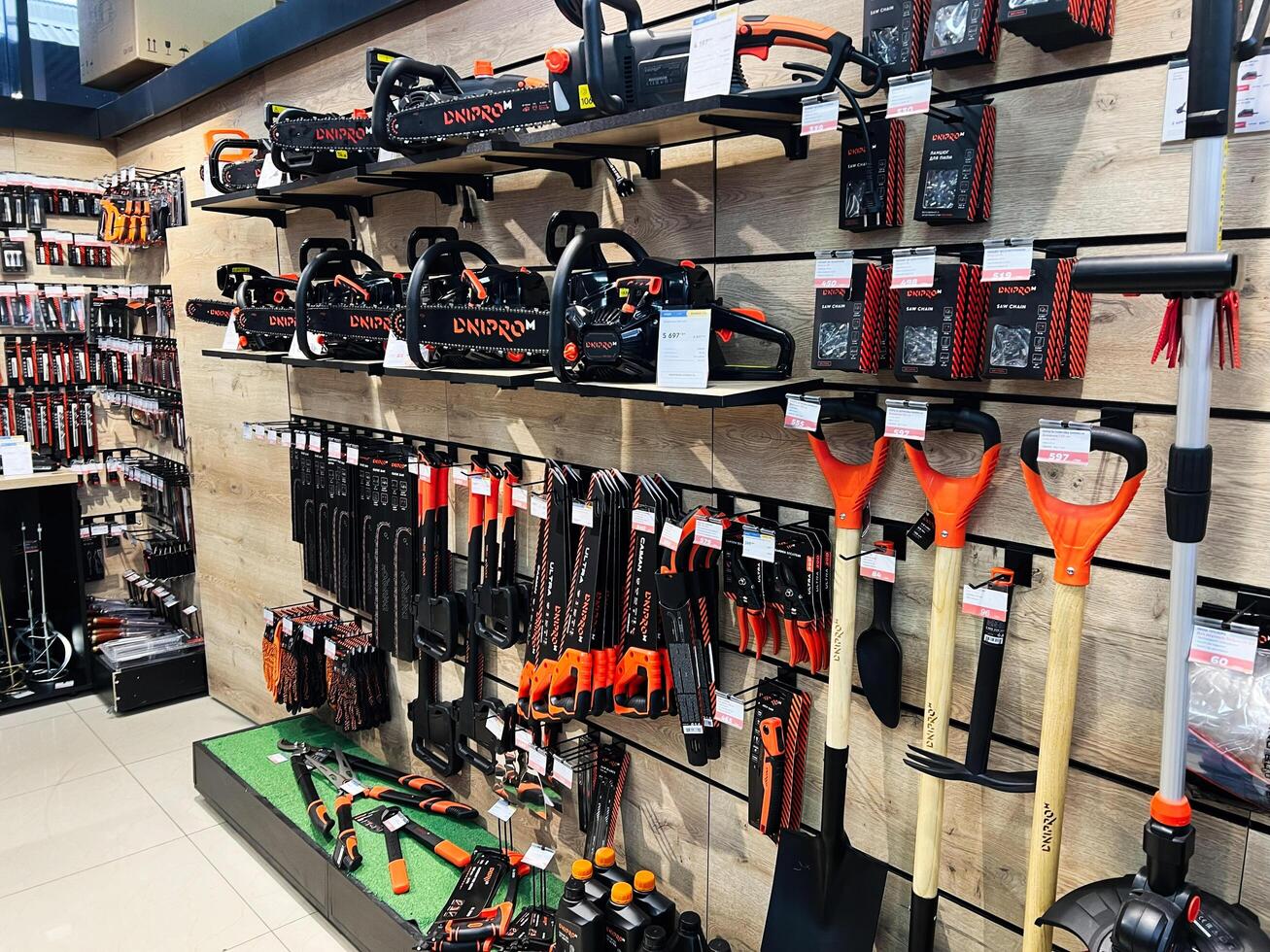 Kyiv, Ukraine - February 04, 2025 Variety of tools and equipment displayed in a retail hardware store photo