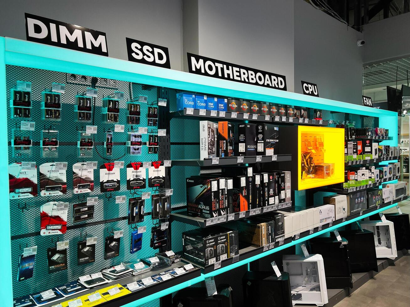 Kyiv, Ukraine - February 04, 2025 Computer hardware store with components shelf including RAM, SSD, motherboard, and CPU photo