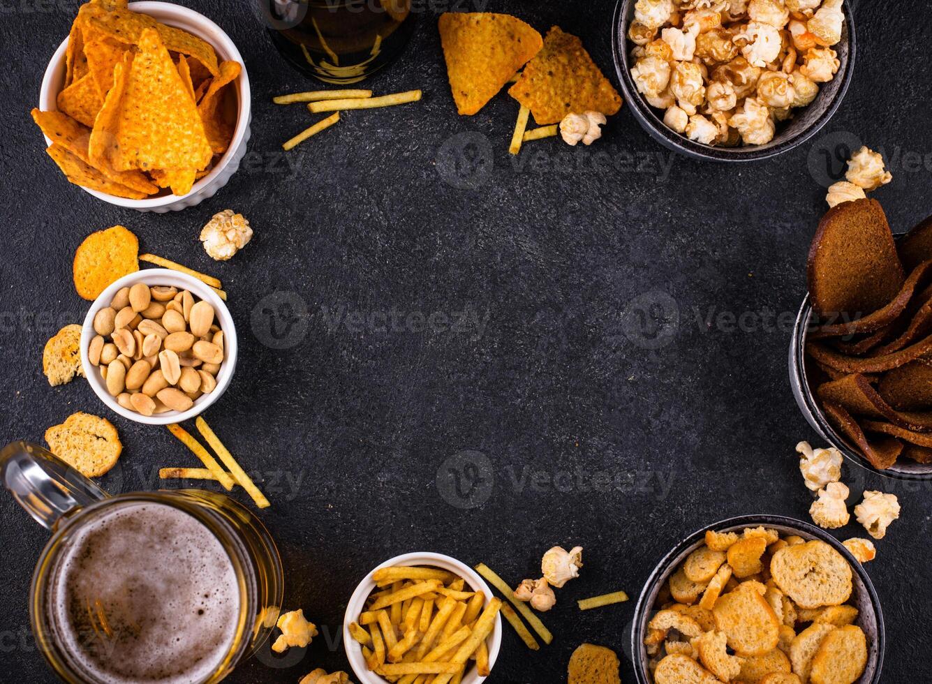 Beer and different snacks for Superbowl or football party photo