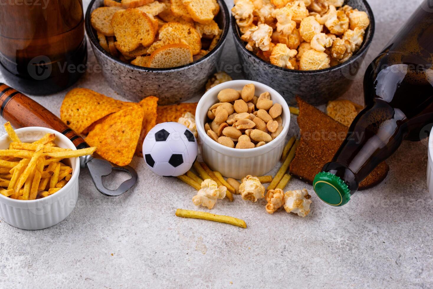 Beer and different snacks for Superbowl or football party photo