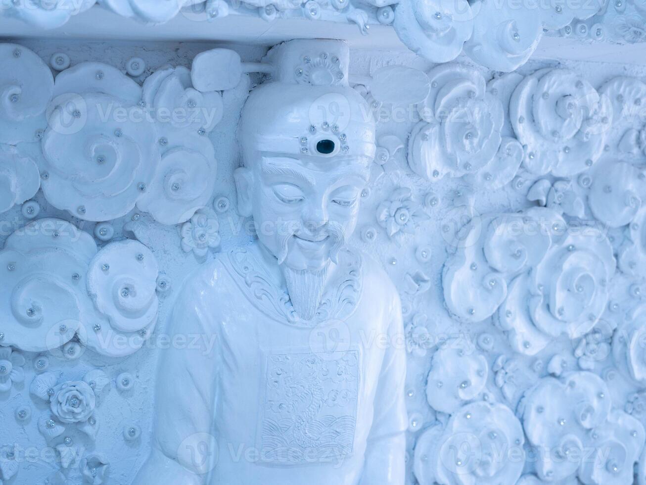 Marble sculpture Buddhism in Asia inside a temple in Thailand. photo