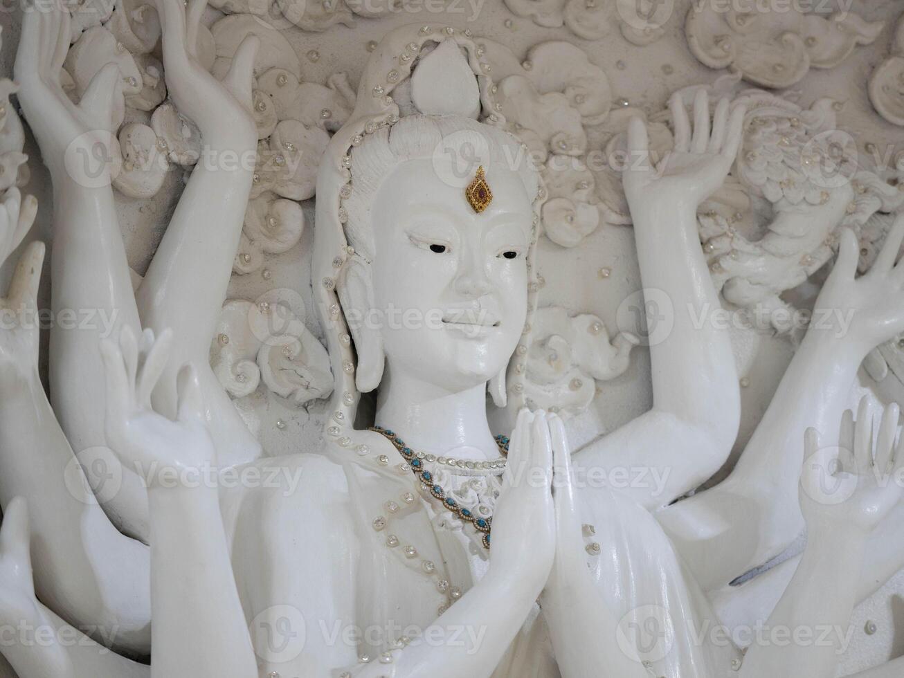 Marble sculpture symbolizing Buddhism in Asia inside. photo
