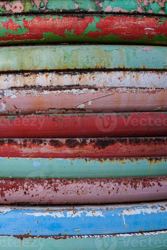 Close-up of a rusty iron fence. Metal rust Metal corrosion. Rust and corrosion on old iron. photo