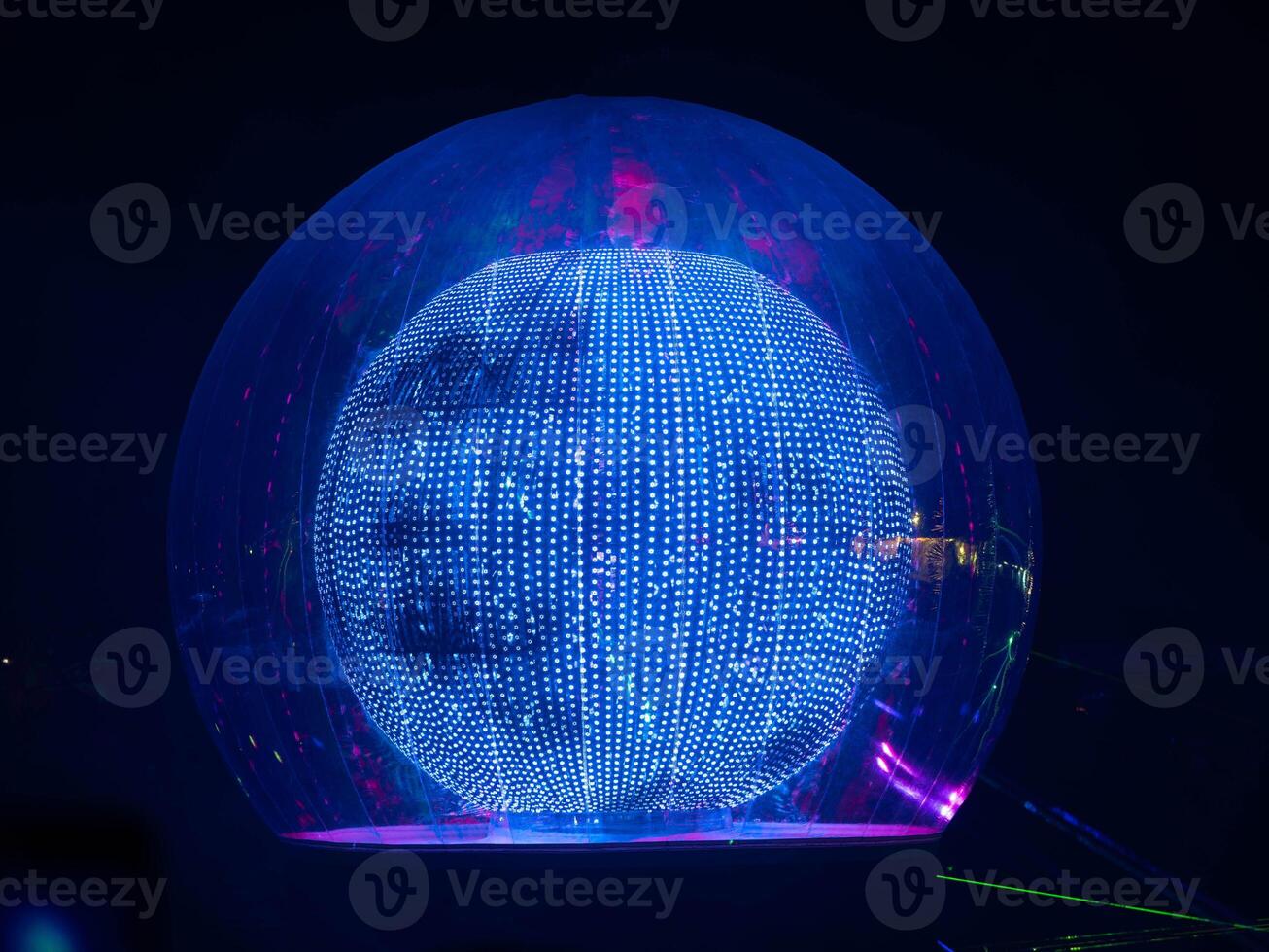 Light and sound show in large crystal ball at the ASEAN Flower Festival in Chiang Rai Province, Thailand photo
